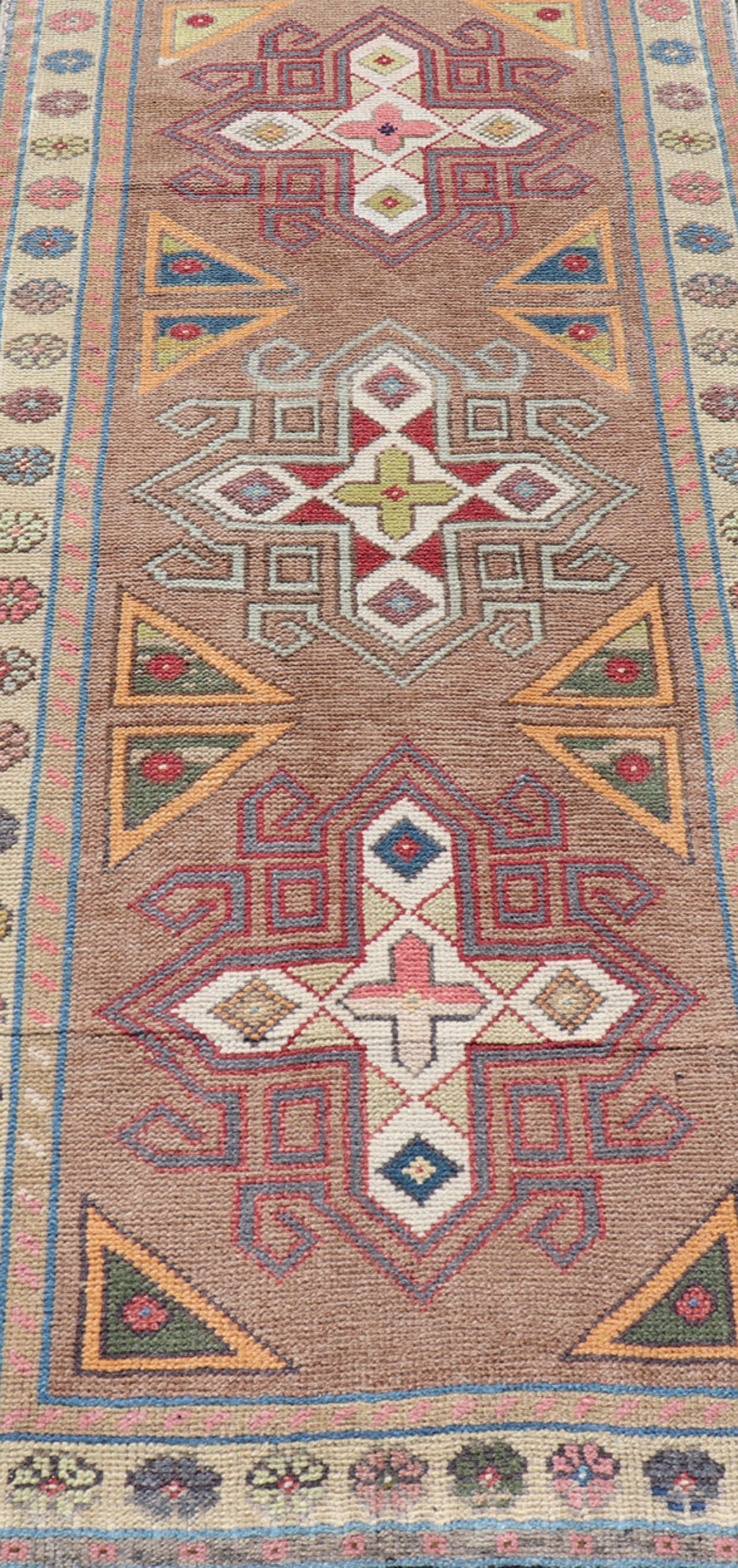 Measures: 2'7 x 5'9 
Vintage Turkish Oushak Geometric Cross Medallion's With Floral Border. Keivan Woven Arts / rug TU-MTU-910, country of origin / type: Turkey / Oushak, circa 1940.

This vintage small rug, from 1940s features an assortment of