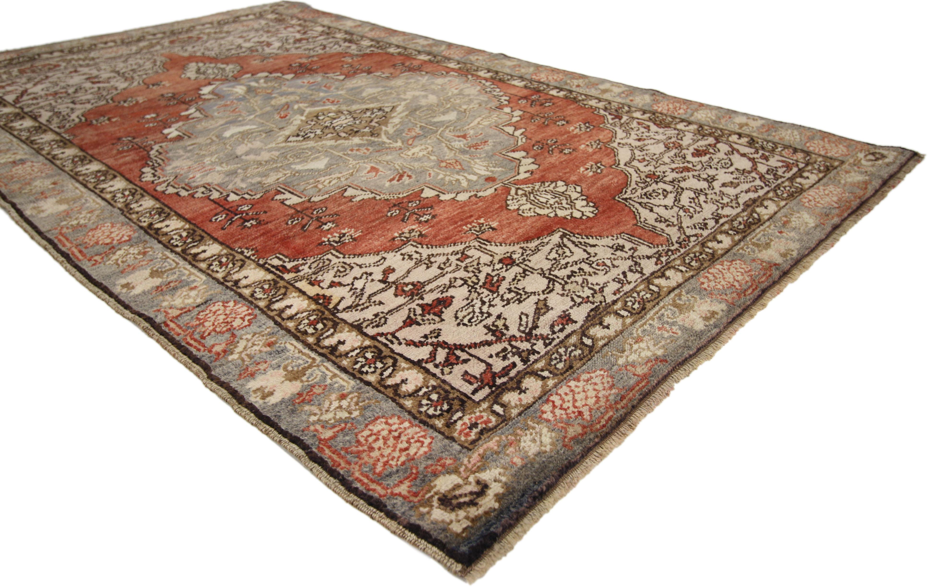 50300, vintage Turkish Oushak rug, hall accent, foyer or entry rug with French Country style. This hand knotted wool vintage Turkish Oushak rug features a large scalloped diamond-shaped medallion with palmette pendants floating in the center of an
