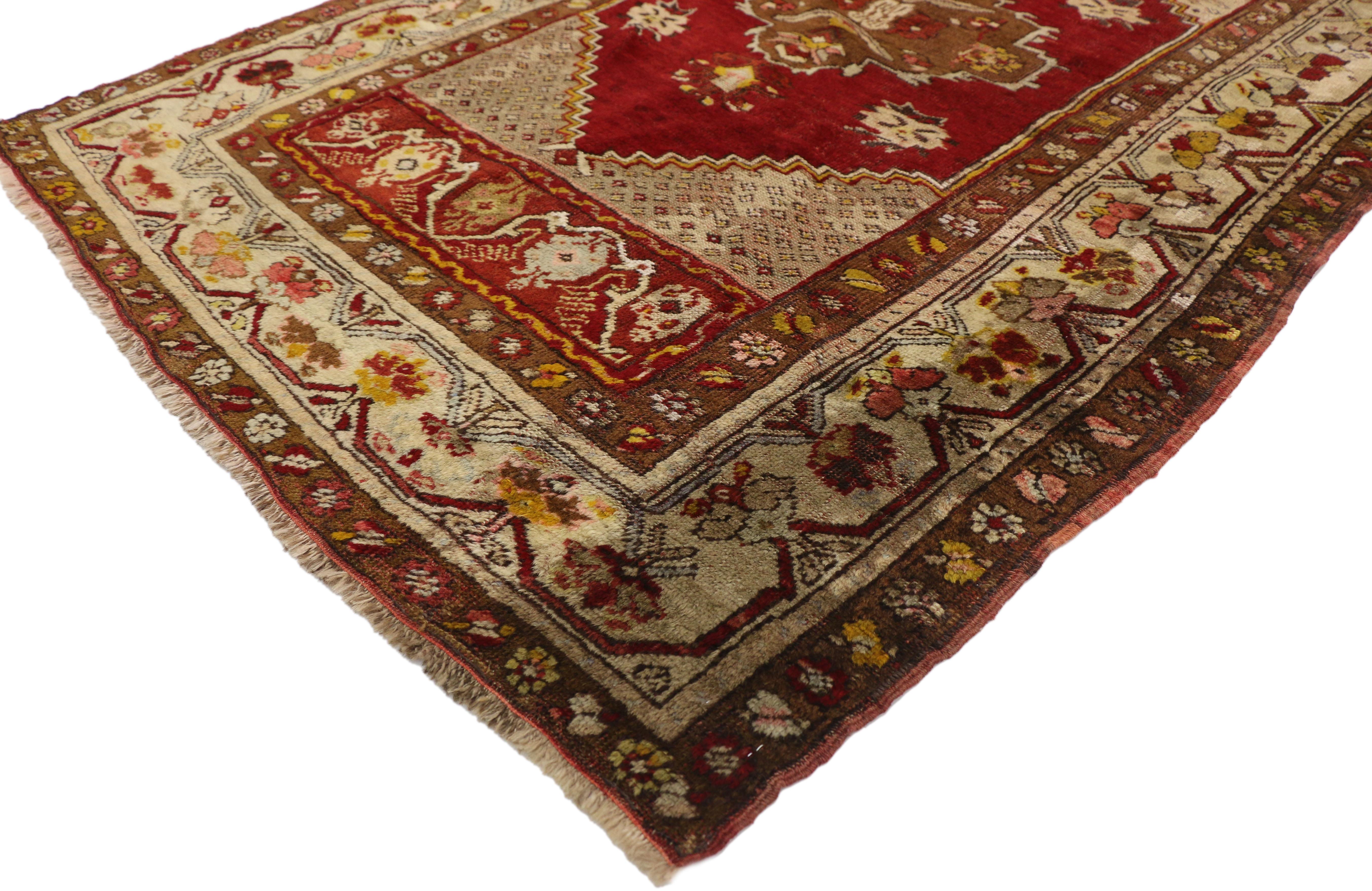 77284 Vintage Turkish Oushak Hallway runner with Modern Art Deco Style. This hand knotted wool vintage Turkish Oushak hallway runner features three cusped coffee-camel colored cusped medallions floating in an abrashed ruby red field dotted with
