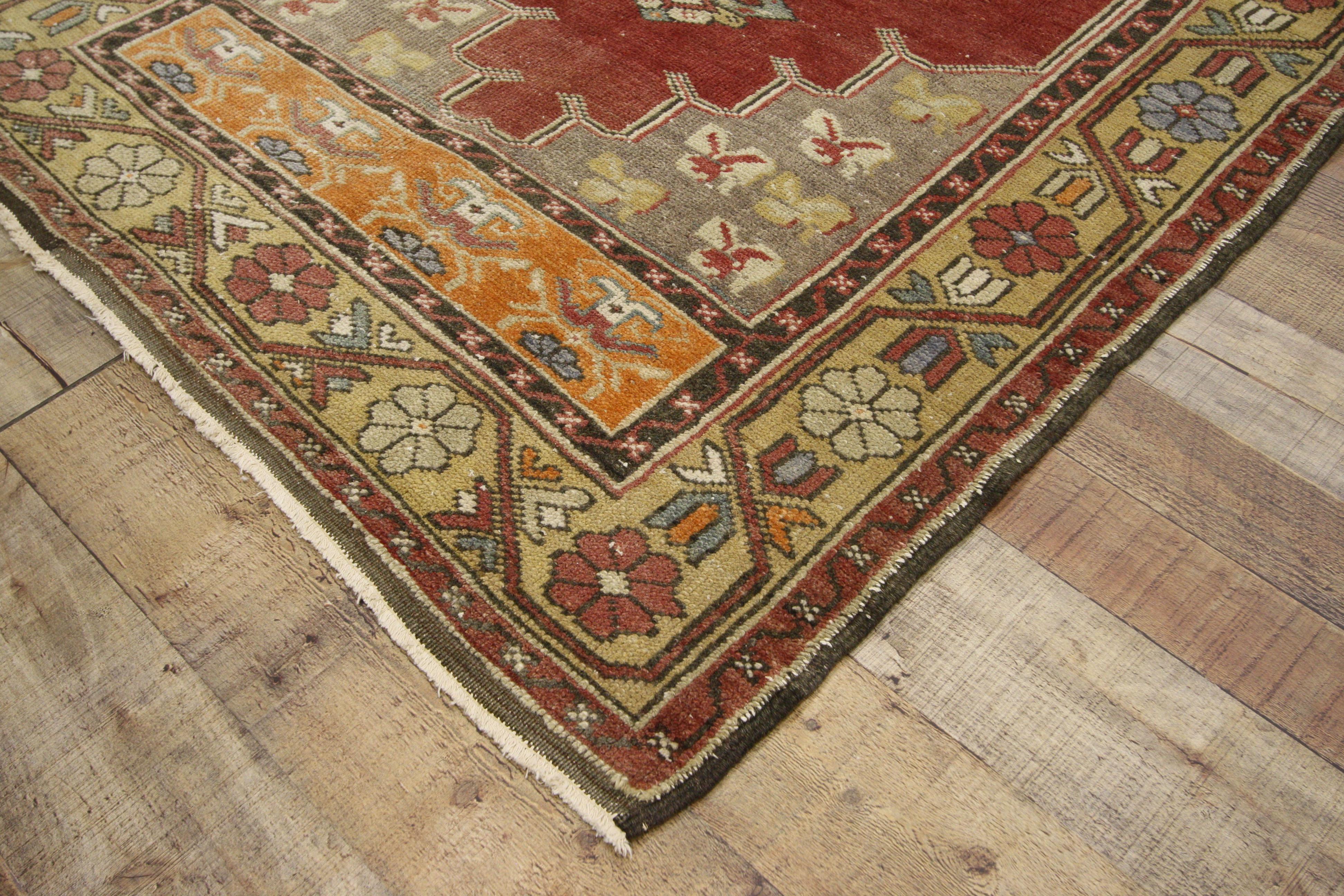 52390, vintage Turkish Oushak Hallway runner with Rustic style. This hand knotted wool vintage Turkish Oushak runner features three connected hexagonal medallions with palmette pendants spread across an abrashed brick red field. Bursting with life,