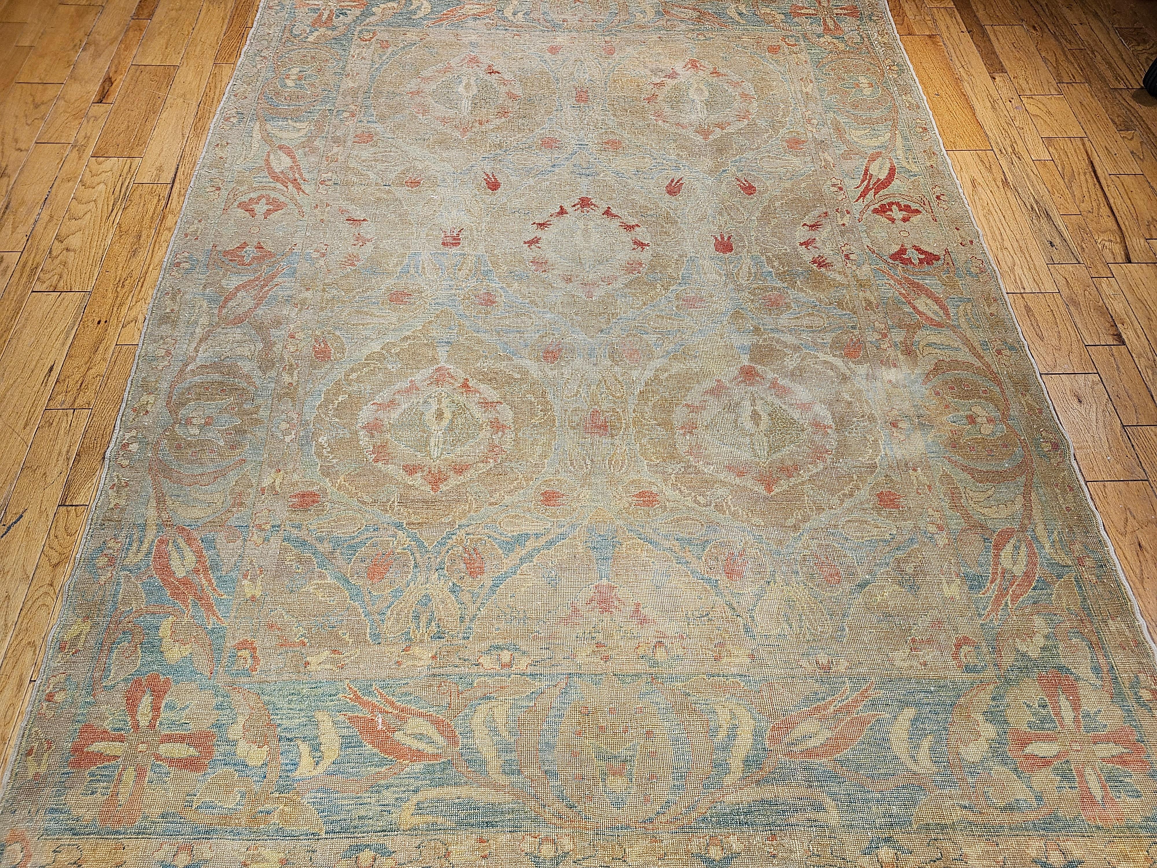 Vintage room size Turkish Oushak in an all over pattern from the early 1900s is in a very desirable “near square” size. The beautiful Oushak rug has a short pile and the large floral design format of branches and leaves are scattered throughout the