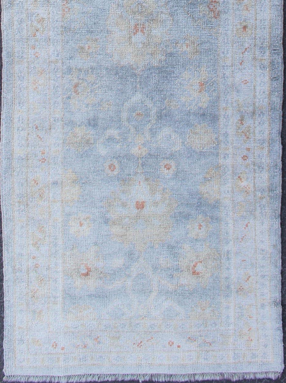 Turkish Oushak over-dyed in blue and gray color
This Turkish carpet with a classical composition has been over-dyed with blue, tan, faded red. With both classic and contemporary characteristics, this beautiful carpet could perfectly adorn a