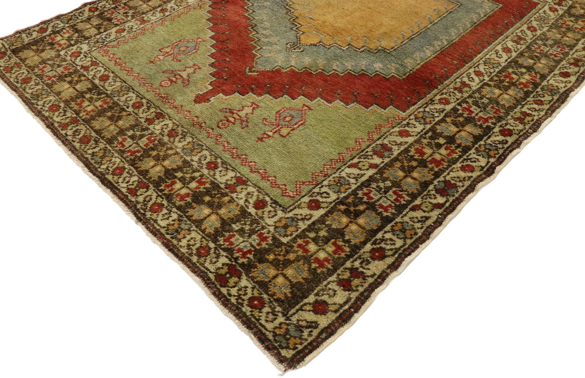 53092 vintage Turkish Oushak Prayer rug with Craftsman style. With its luminous warm hues and beguiling beauty, this hand knotted wool vintage Turkish Oushak prayer rug is immersed in Anatolian history. It features a concentric mihrab niche with
