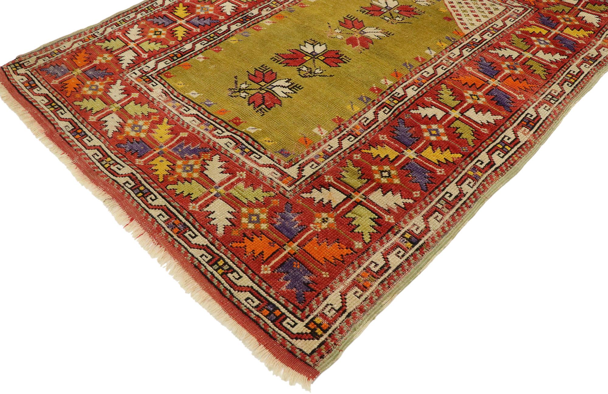 53103 vintage Turkish Oushak Prayer rug with craftsman style. With its luminous warm hues and beguiling beauty, this hand knotted wool vintage Turkish Oushak prayer rug is immersed in Anatolian history. It features a mihrab niche highlighting four