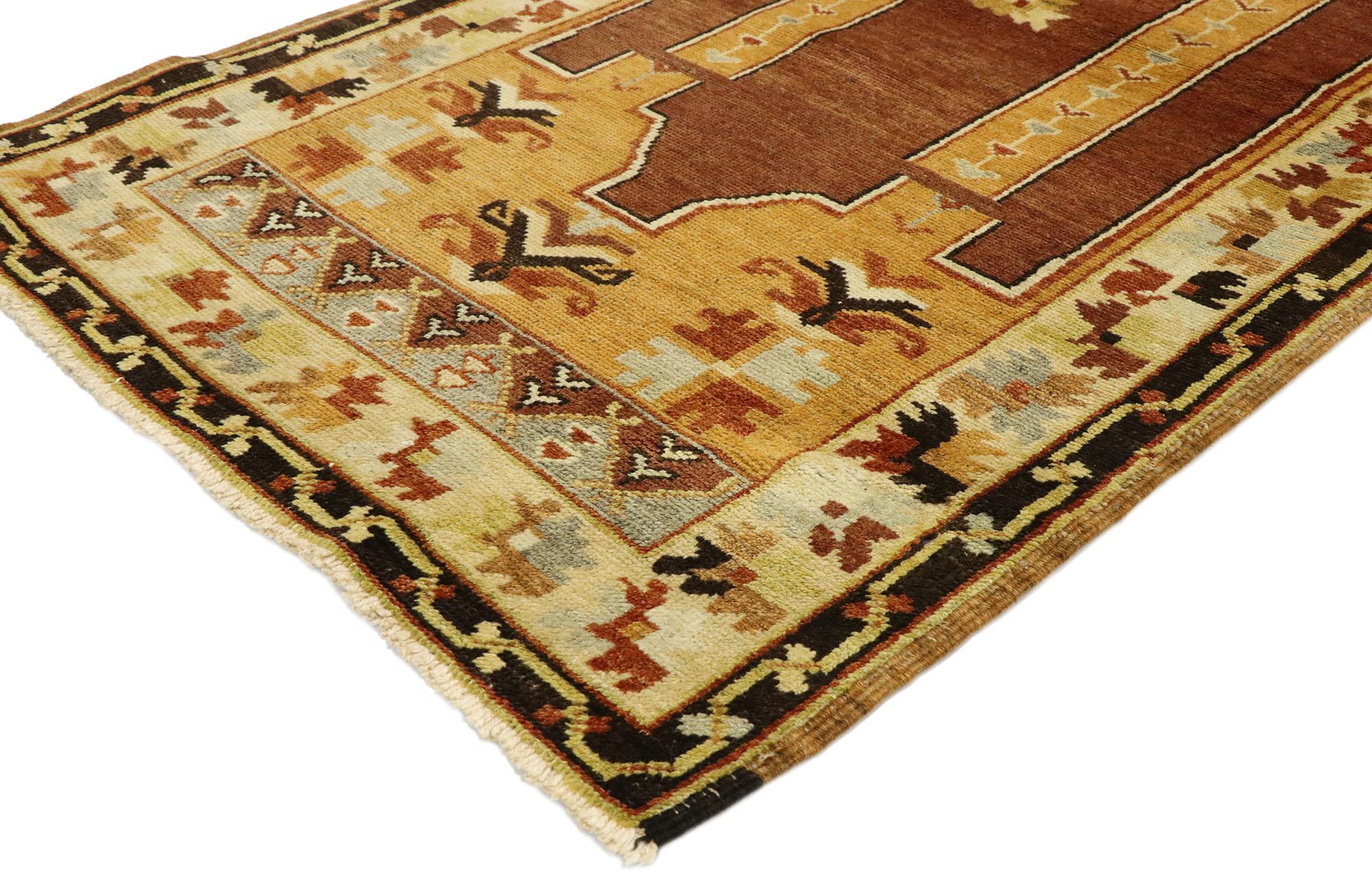 50118, vintage Turkish Oushak Prayer rug with Mid-Century Modern style. Warm and inviting, this hand knotted wool vintage Turkish Oushak prayer rug is poised to impress. It features a double mihrab niche with two columns dotted with a serrated motif