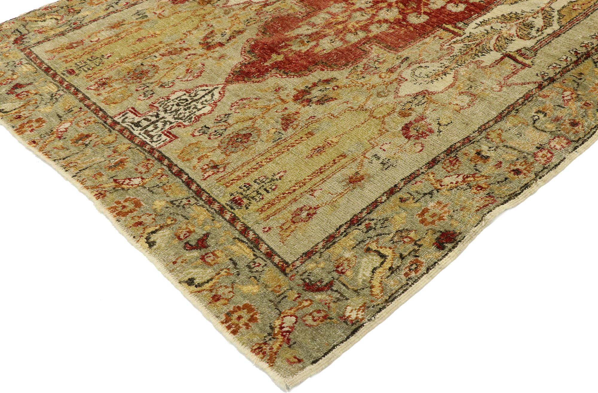 53071, vintage Turkish Oushak prayer rug with Rustic Tuscan style. Imbued with earthy-inspired hues and architectural elements of naturalistic forms, this hand knotted wool vintage Turkish Oushak rug beautifully embodies rustic Tuscan style. The