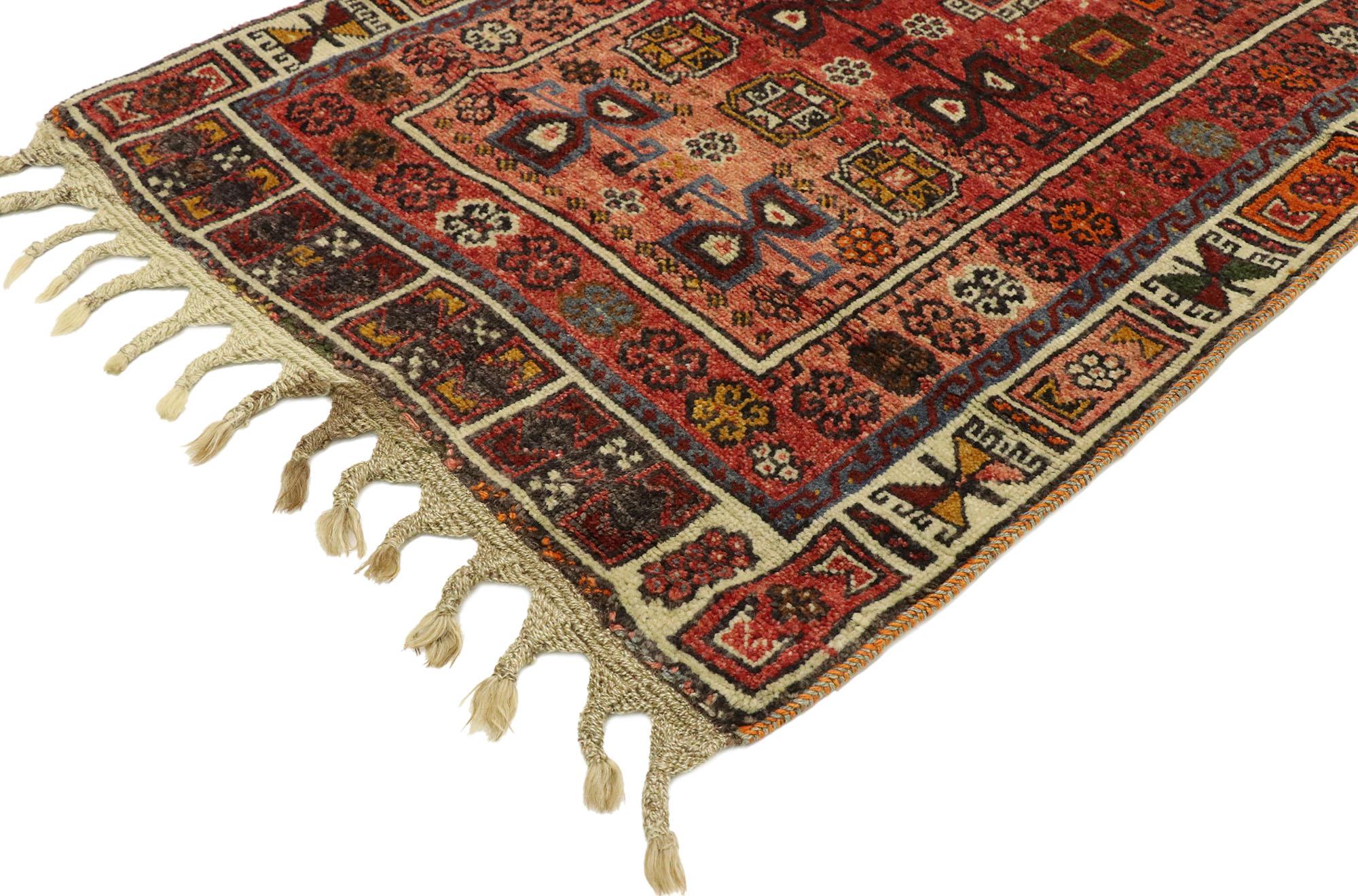 53038, vintage Turkish Oushak Prayer rug with Tribal Folk Art Charm. With its luminous warm hues and beguiling beauty, this hand knotted wool vintage Turkish Oushak prayer rug is immersed in Anatolian history. It features a hooked mihrab niche