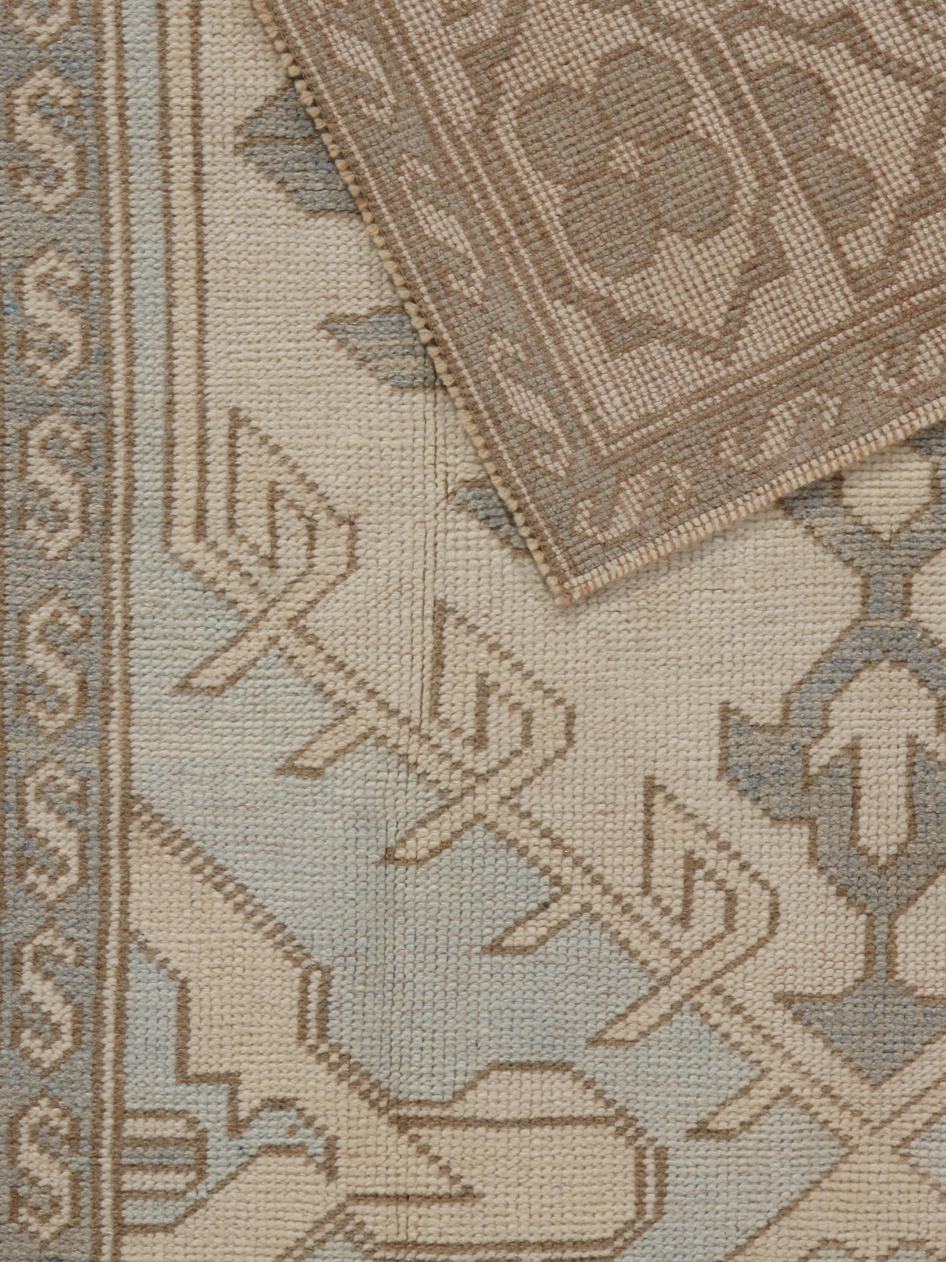 Vintage Subdued Ivory Blue Turkish Wool Hand Knotted Oushak Rug In Good Condition For Sale In New York, NY