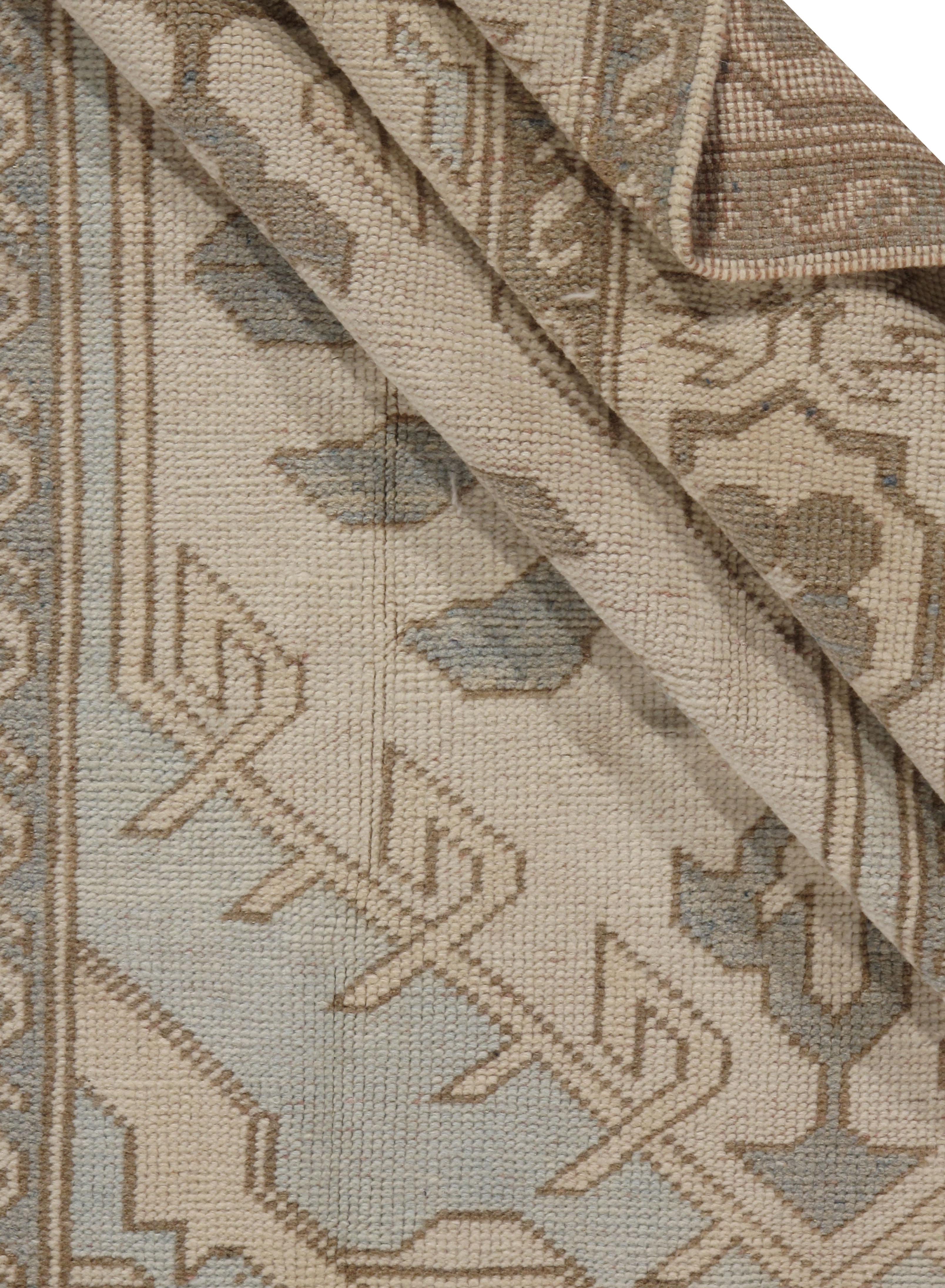 Vintage Subdued Ivory Blue Turkish Wool Hand Knotted Oushak Rug For Sale 1