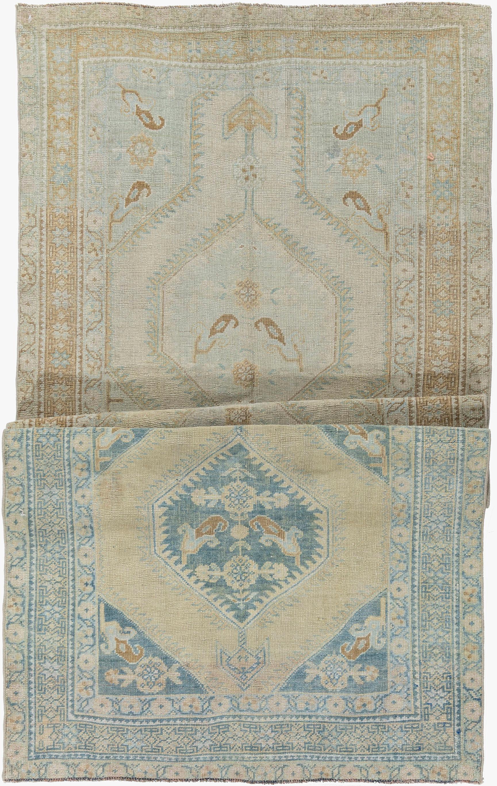 This lovely Rug hand knotted in Turkey in the 1940's has a natural abrash (color change) common in old pieces and giving a uniqueness to the rug. This lovely Rug hand knotted in Turkey in the 1940's has a natural abrash (color change) common in old