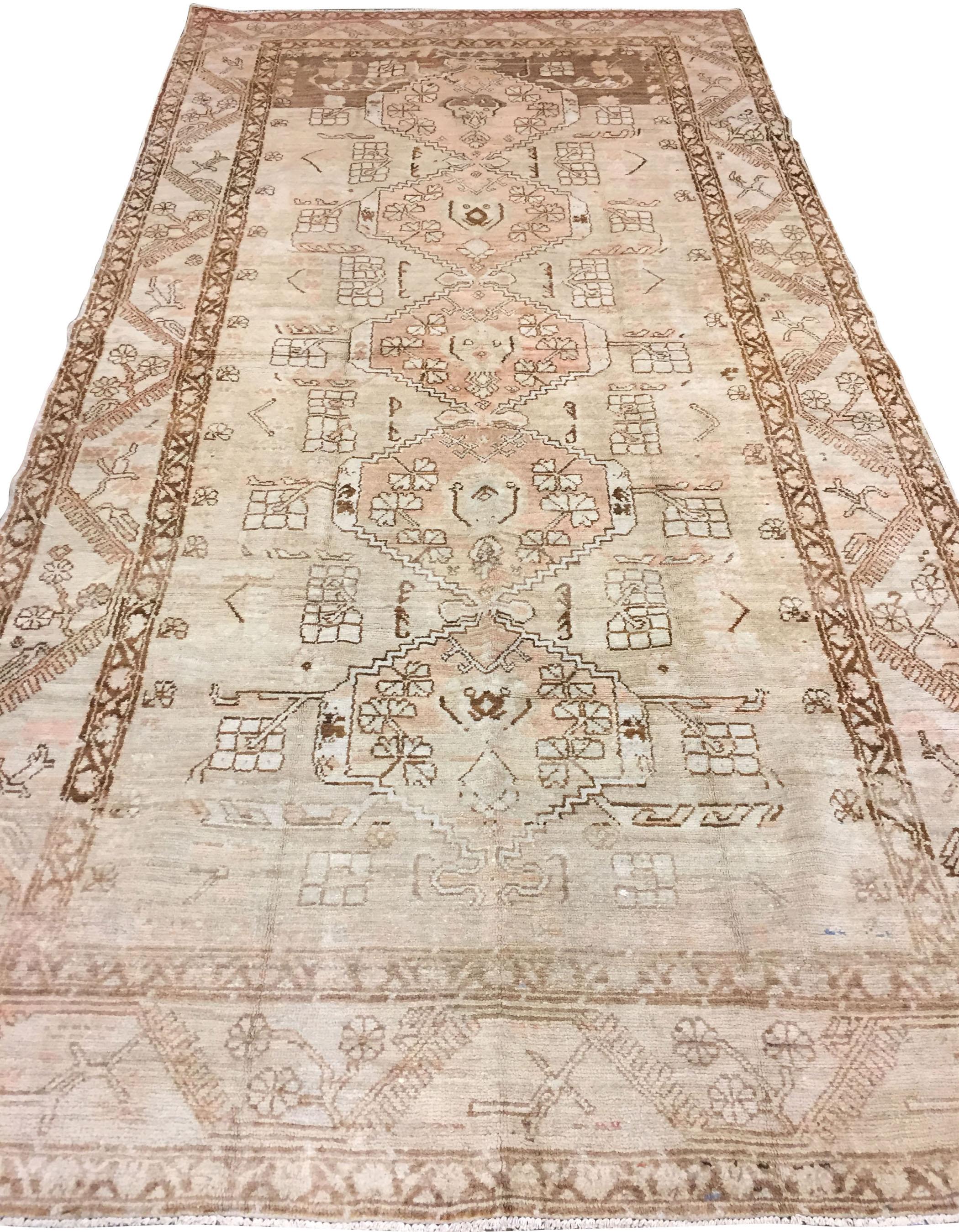 Vintage Turkish Oushak rug 4'9 X 9'2. Hand-woven in Turkey where rug weaving is the culture rather than a business. Rugs from Turkey are known for the high quality of their wool their beautiful patterns and warm colors. These designer favorites will