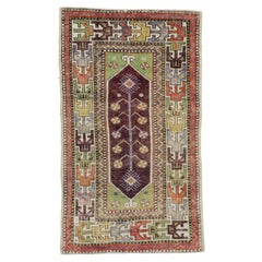 Vintage Turkish Yuntdag Oushak Rug, Tribal Allure Meets Worldly Sophistication