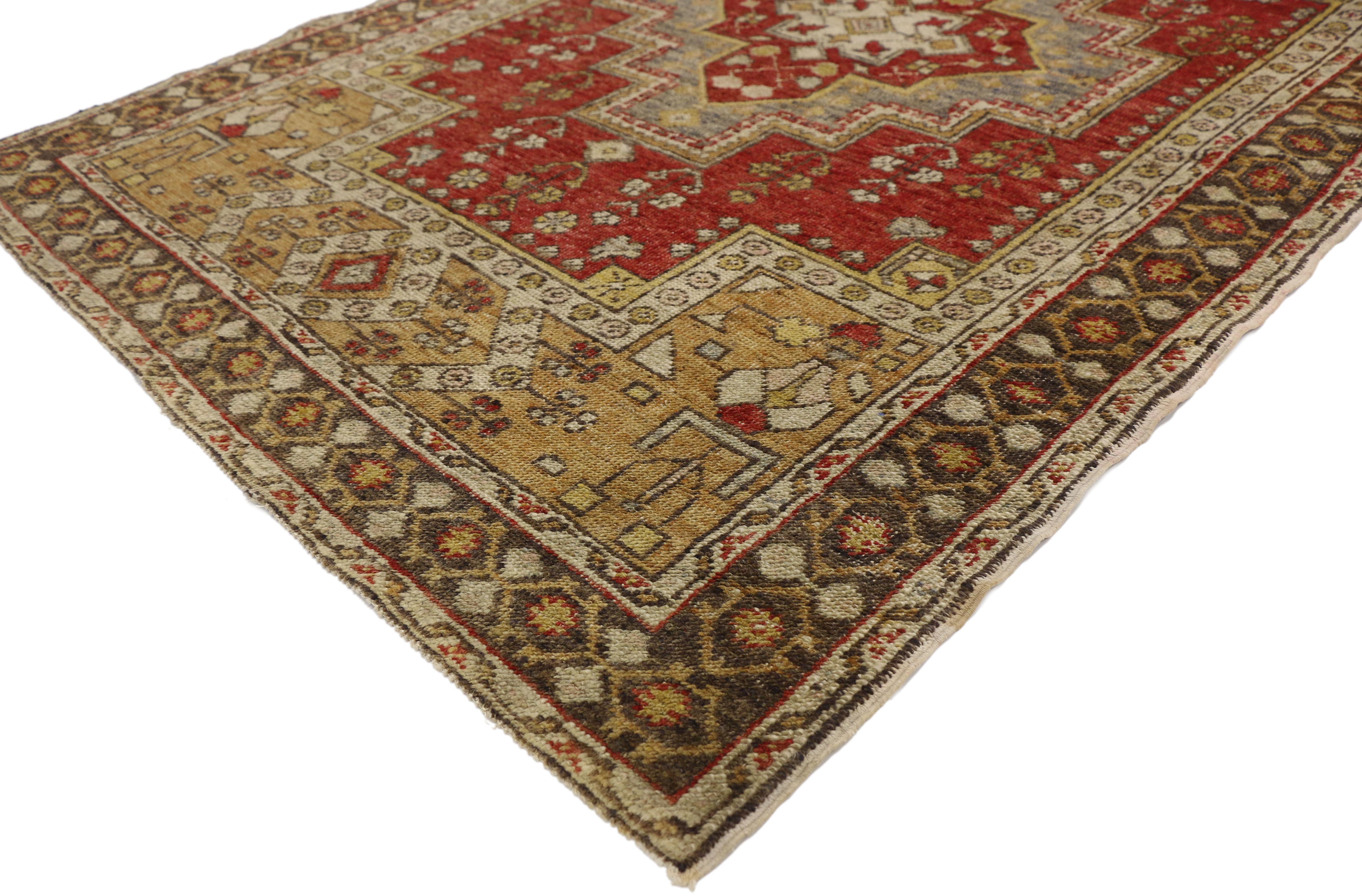 77281, vintage Turkish Oushak rug for entry, kitchen, foyer, or bathroom. This hand knotted wool vintage Turkish Oushak rug features a stepped medallion filled with a cruciform cross-like motif. The stepped central medallion is surrounded by floral