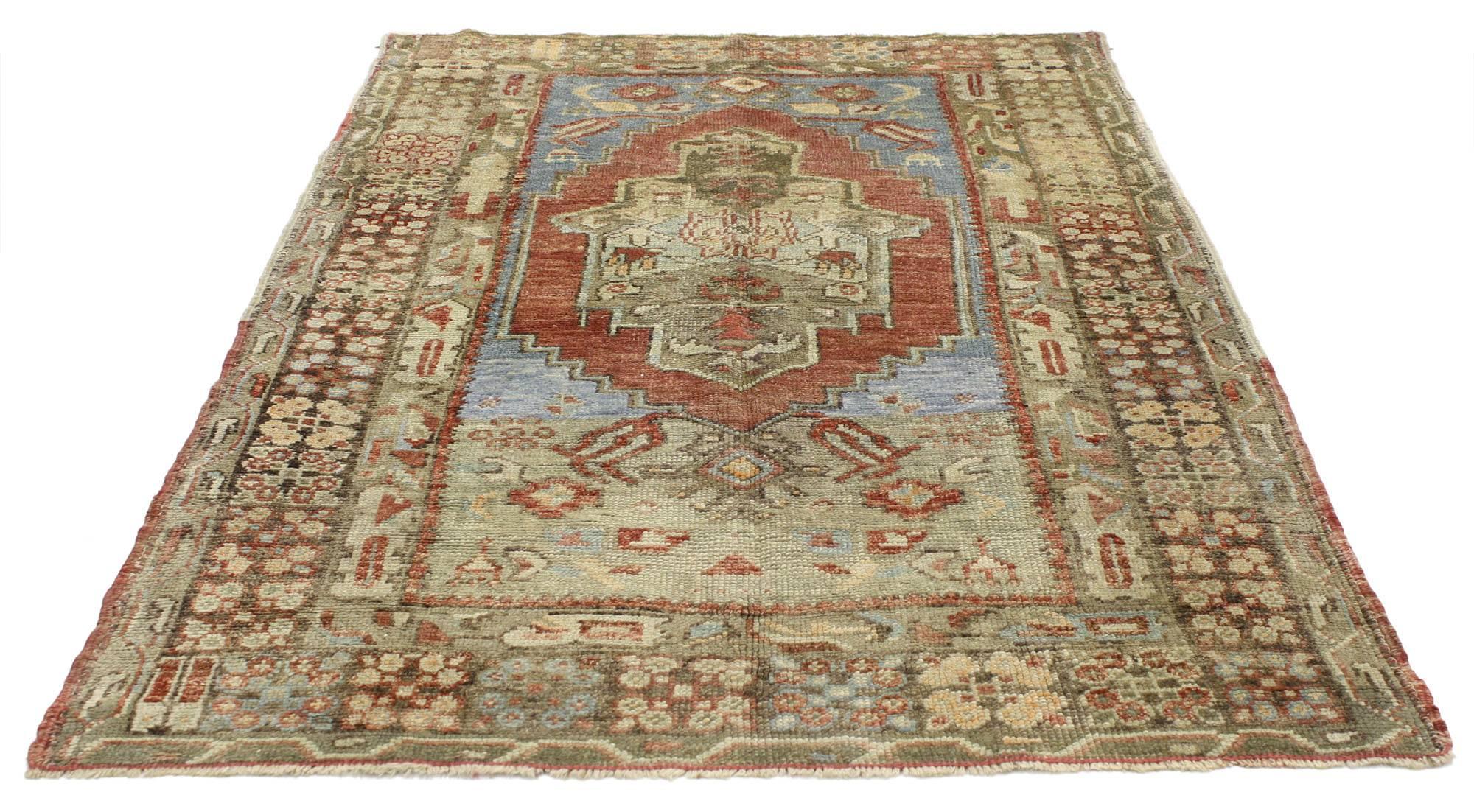 52258 Vintage Turkish Oushak Rug with Rustic Artisan Style 03'04 x 05'03. Warm and inviting, this hand-knotted wool vintage Turkish Oushak rug beautifully displays rustic artisan charm. It features a central medallion with stepped edges surrounded