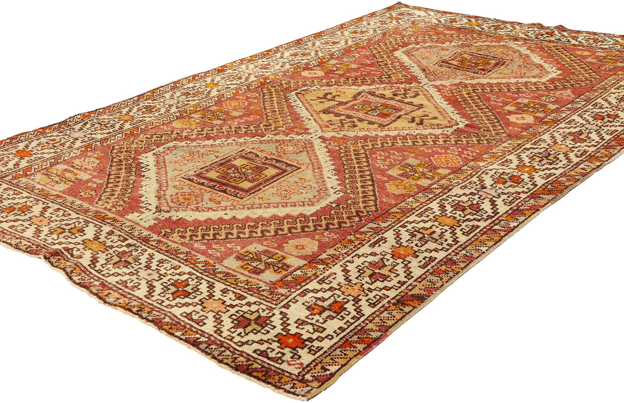 52107 Vintage Red Turkish Oushak Rug, 04'04 x 07'00. Turkish tribal Oushak rugs, adorned with captivating latch hook lozenge medallions, originate from the storied rug-making heart of Oushak in western Turkey. These vibrant treasures weave together