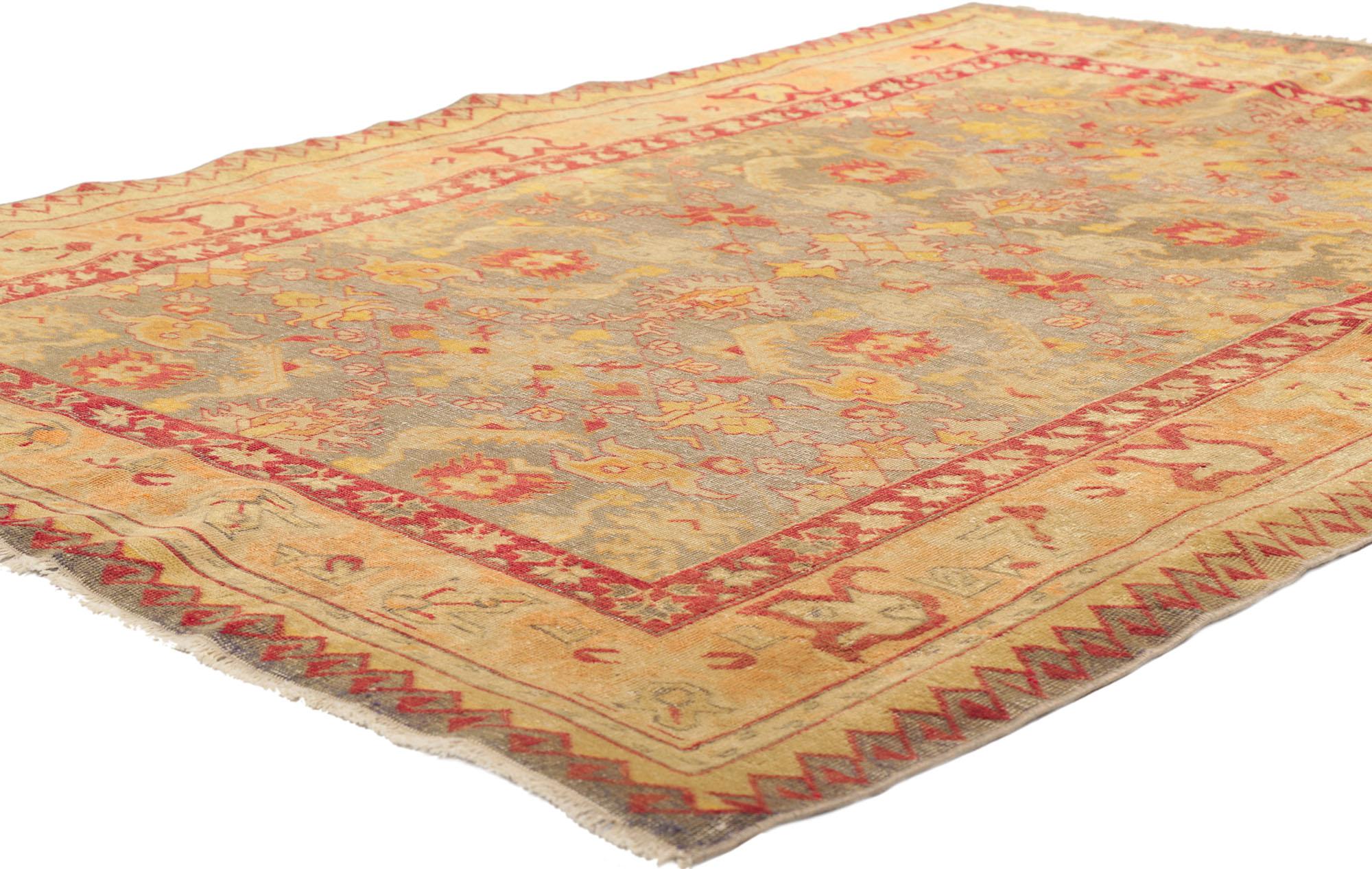 53722 Distressed Vintage Turkish Oushak Rug, 04'06 x 06'00.
Rustic sensibility meets weathered finesse in this hand knotted wool distressed vintage Turkish Oushak rug. The botanical design and bold color scheme woven into this piece work together