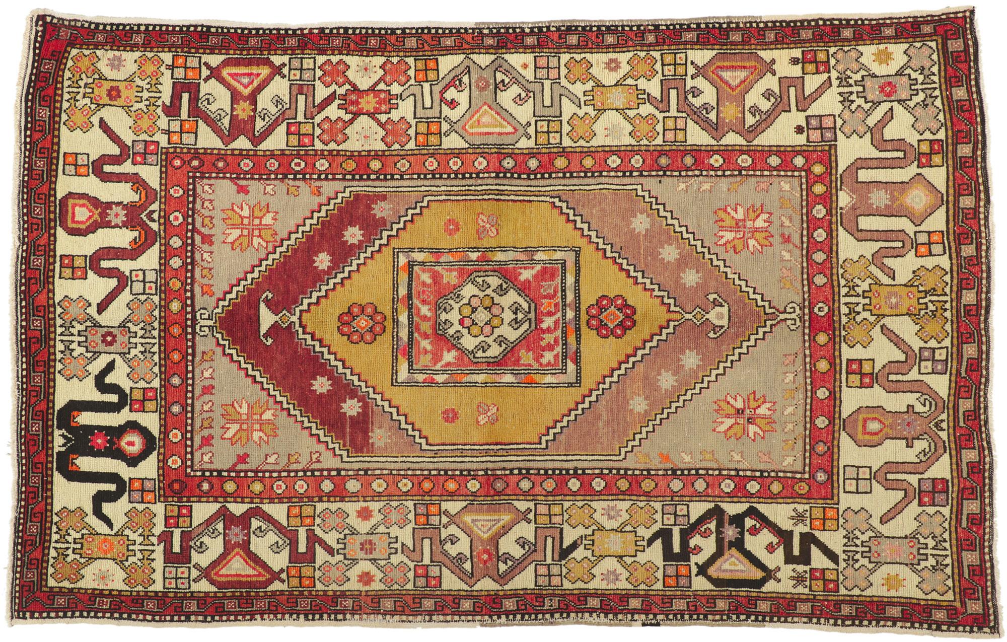 50328 Vintage Turkish Oushak rug, 05.03 X 08.05.
Showcasing a bold expressive design, incredible detail and texture, this hand knitted wool vintage Turkish Oushak rug is a captivating vision of woven beauty. The eye-catching medallion design and