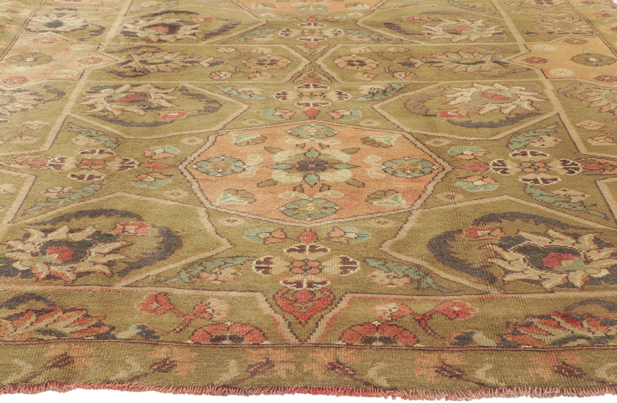 51672 vintage Turkish oushak rug, 05'07 x 09'00.
Warm and inviting with incredible detail and texture, this hand knotted wool vintage Turkish Oushak rug is a captivating vision of woven beauty. The compartmental design and earthy colorway woven