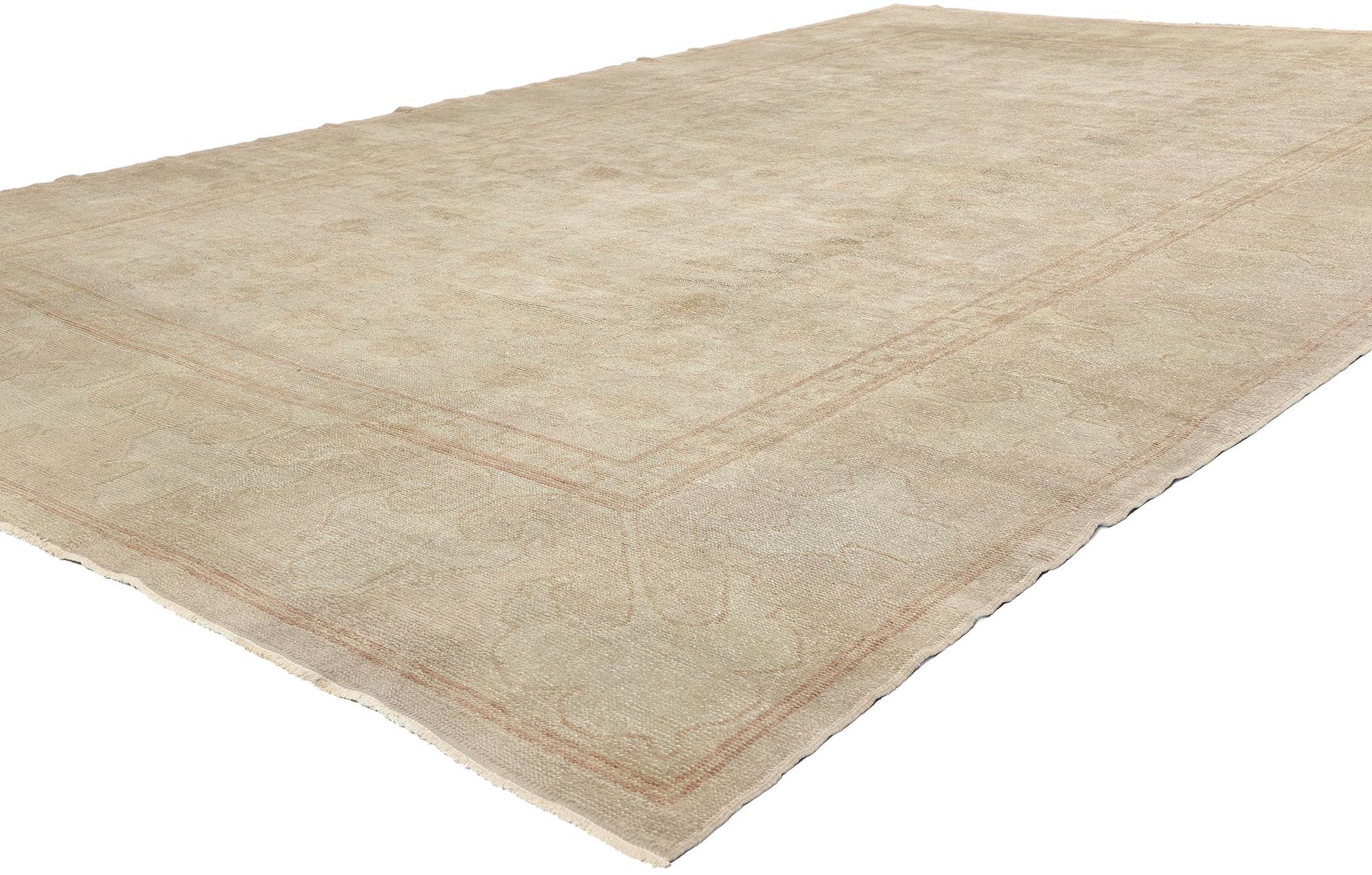 50866 Distressed Vintage Muted Turkish Oushak Rug, 09'07 x 14'10. Immersed in centuries-old tradition and meticulously crafted by skilled artisans, antique-washed Turkish Oushak rugs hail from the revered Oushak region, where they undergo a special