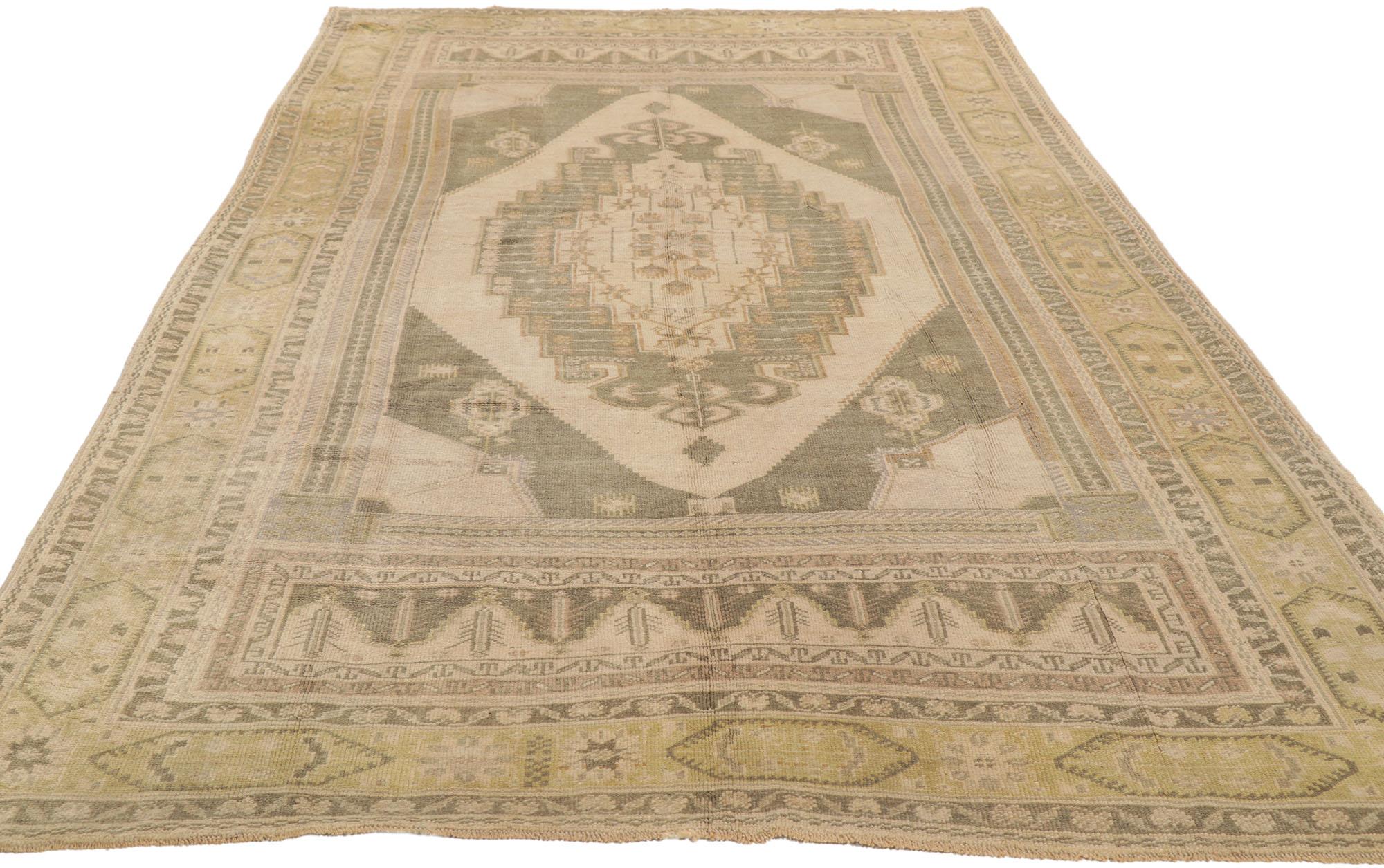 Hand-Knotted Vintage Muted Turkish Oushak Rug, Classic Charm Meets Modern Flair For Sale
