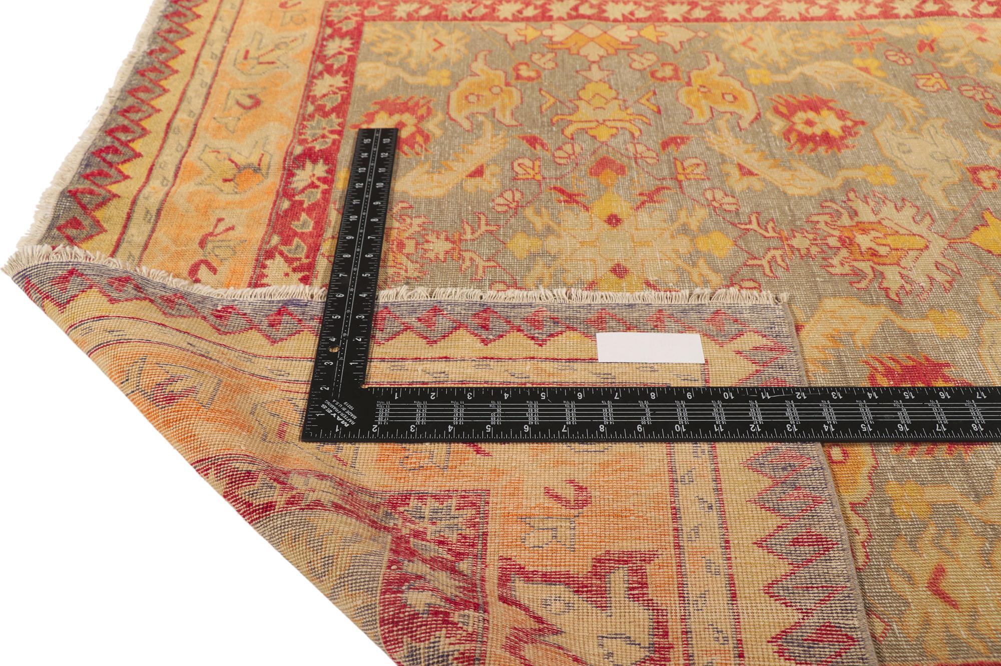 20th Century Vintage Turkish Oushak Rug, Rustic Sensibility Meets Weathered Finesse For Sale