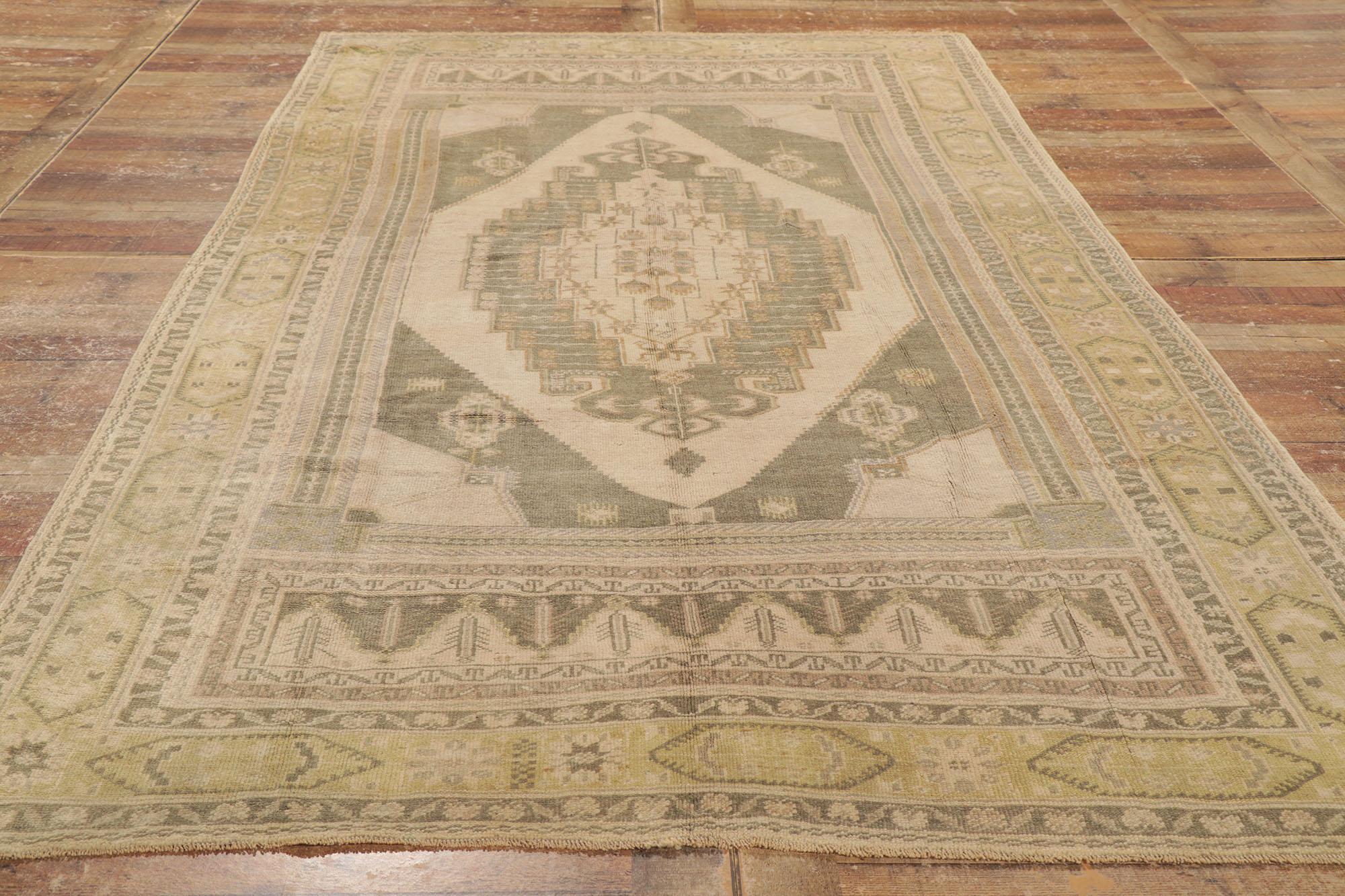 Vintage Muted Turkish Oushak Rug, Classic Charm Meets Modern Flair For Sale 1