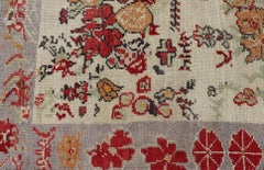 Vintage Turkish Oushak Rug in All-Over Flower Design Background & Boteh Border