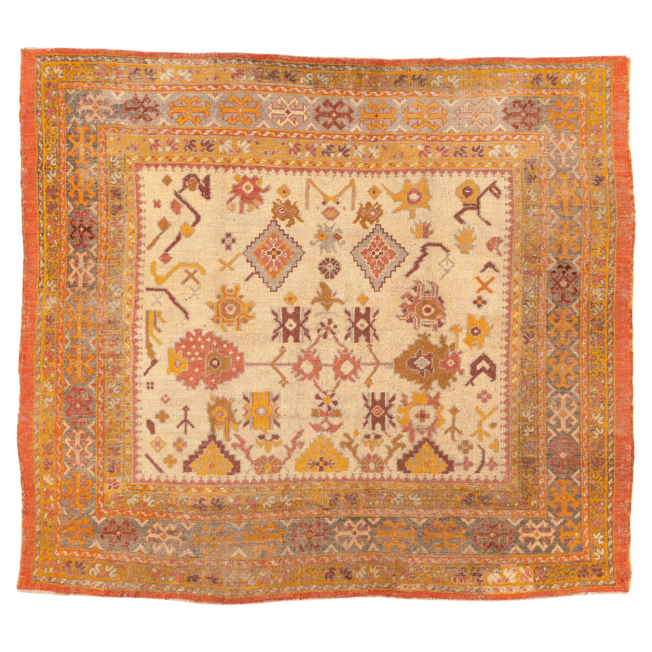 Vintage Turkish Oushak Rug in Ivory with Warm Coral and Saffron Accents
