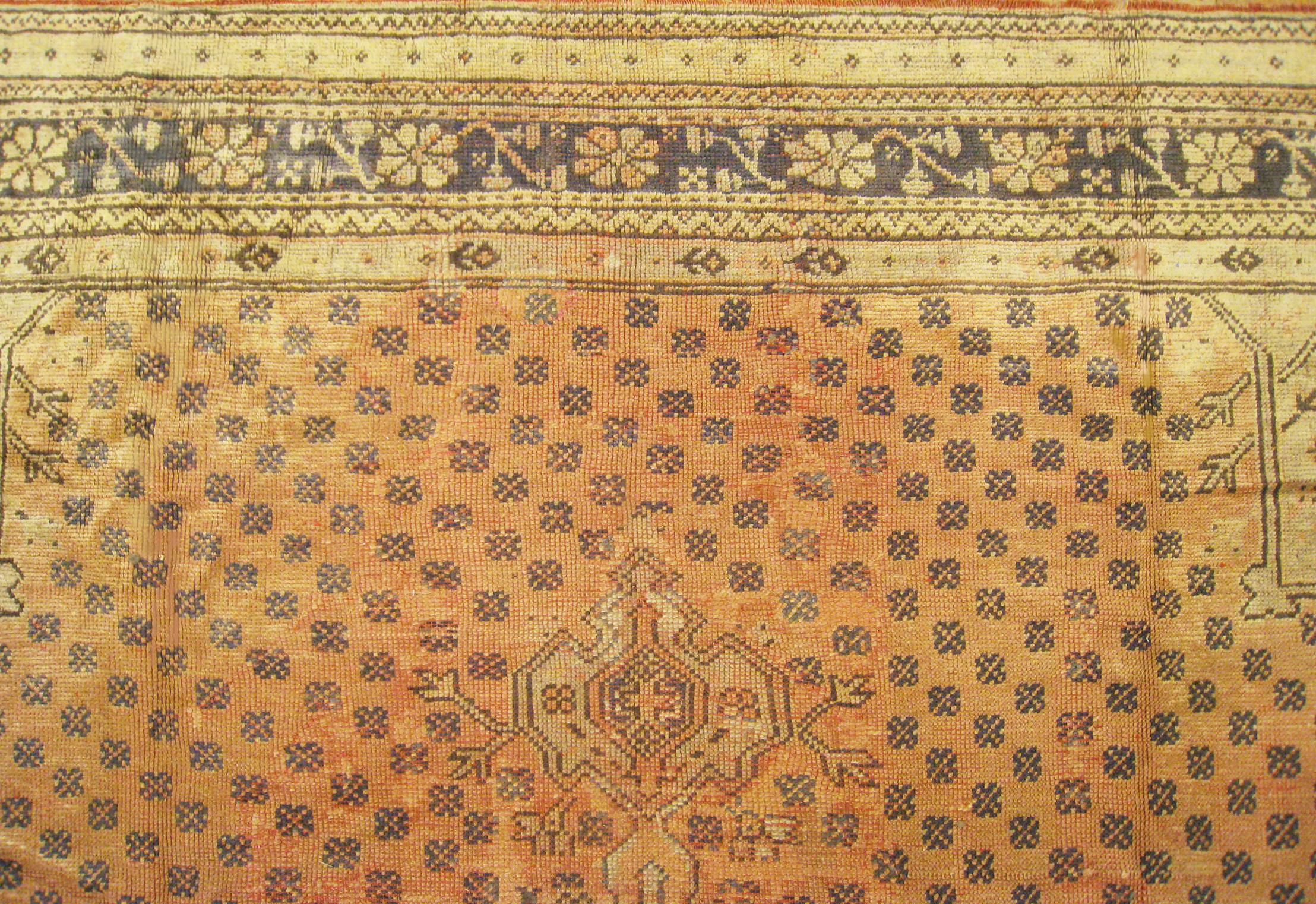 Mid-20th Century Vintage Turkish Oushak Rug, in Large Size, with Earth Tones in the Covered Field For Sale
