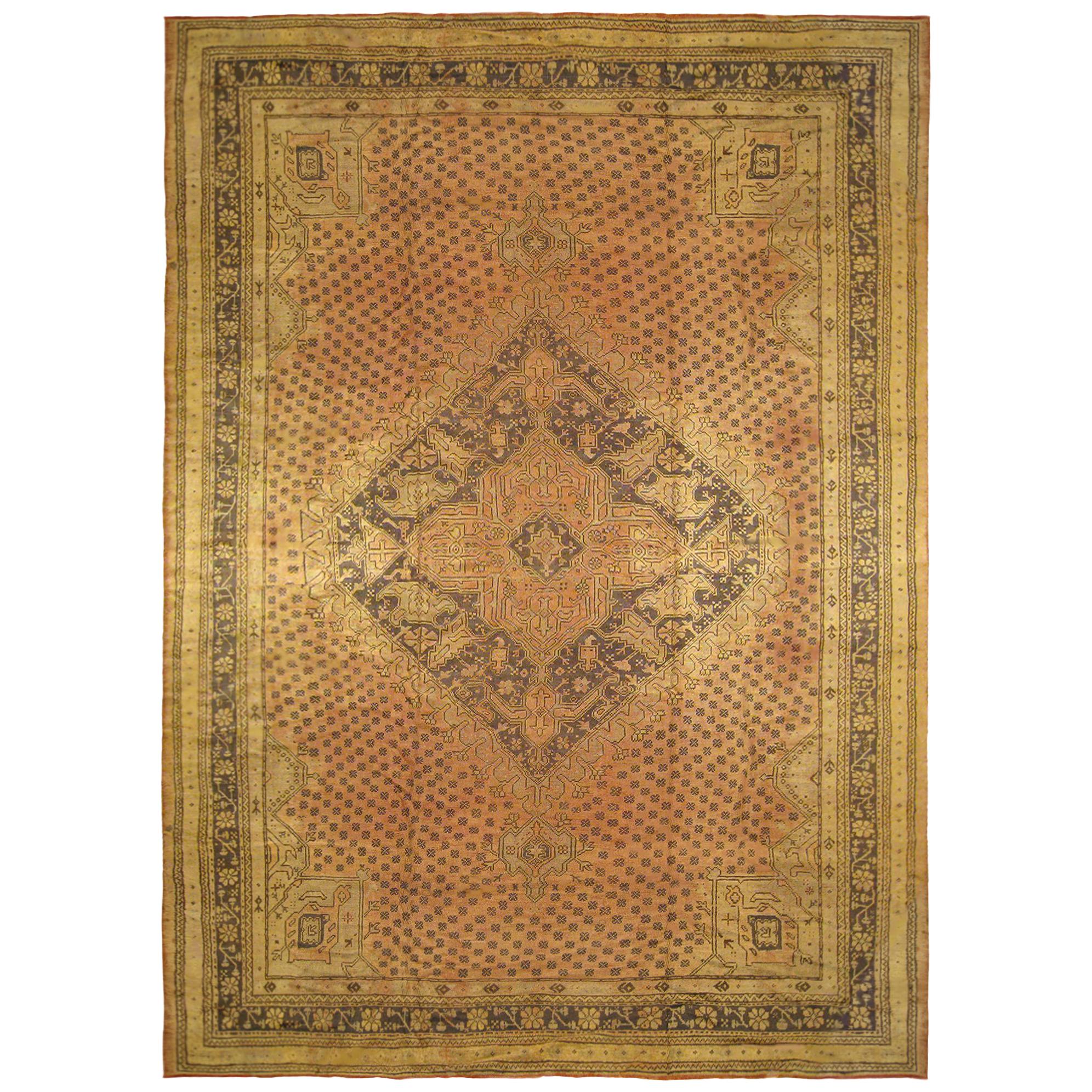 Vintage Turkish Oushak Rug, in Large Size, with Earth Tones in the Covered Field For Sale