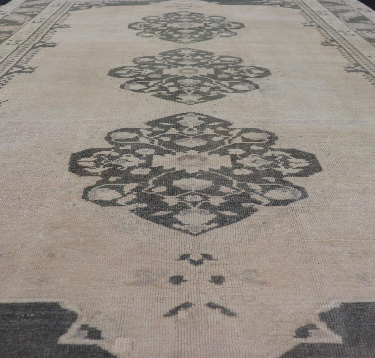 Hand-Knotted Vintage Turkish Oushak Rug in Pastel and Dark Green Floral Patterns 7'5 x 9'9 For Sale