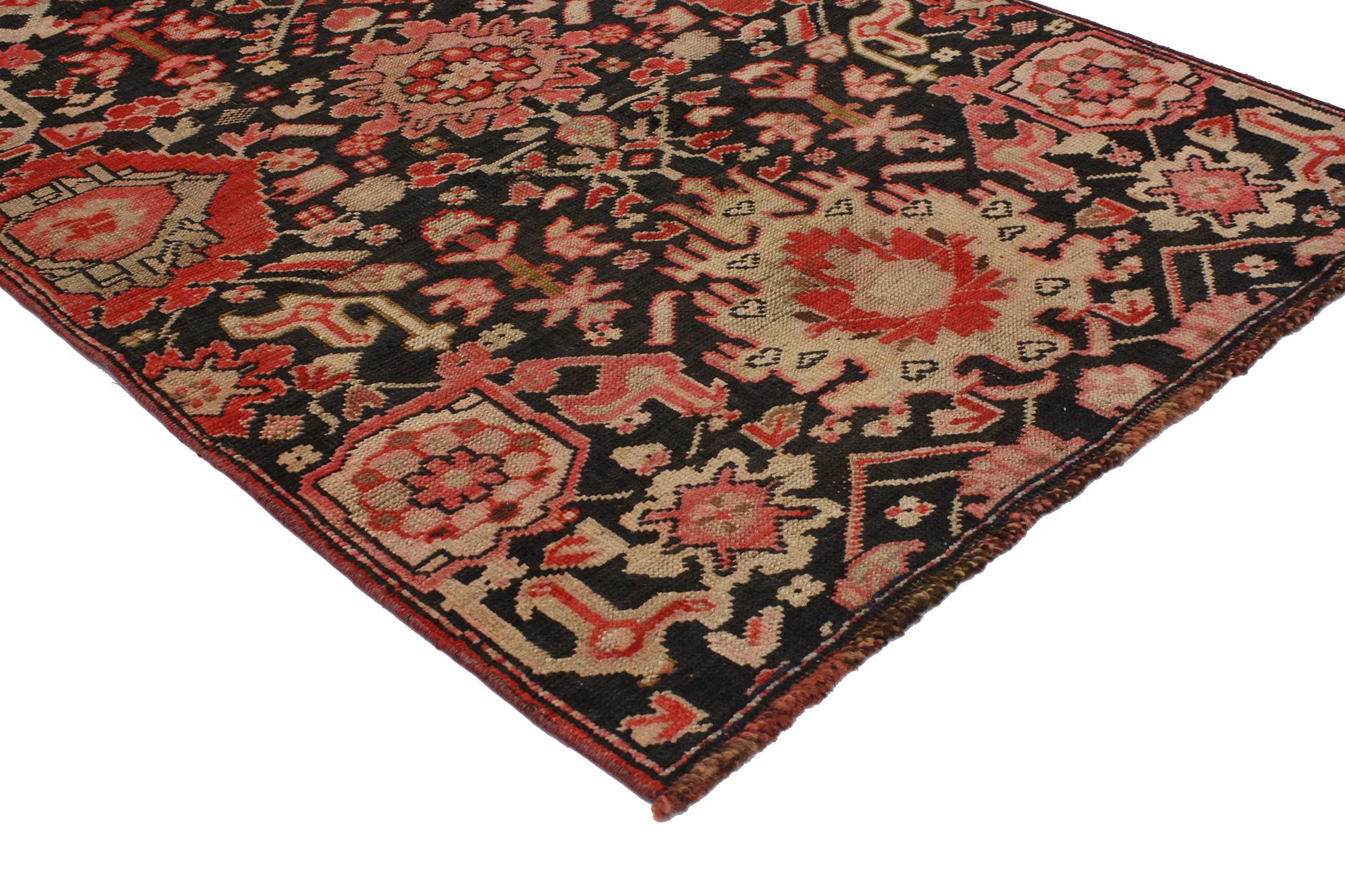 51769 Vintage Turkish Oushak Rug, 02'10 x 04'01.
Maximalist style meets traditional sensibility in this hand knotted wool vintage Turkish Oushak rug. The intrinsic botanical design and energetic earthy colorway woven into piece work together