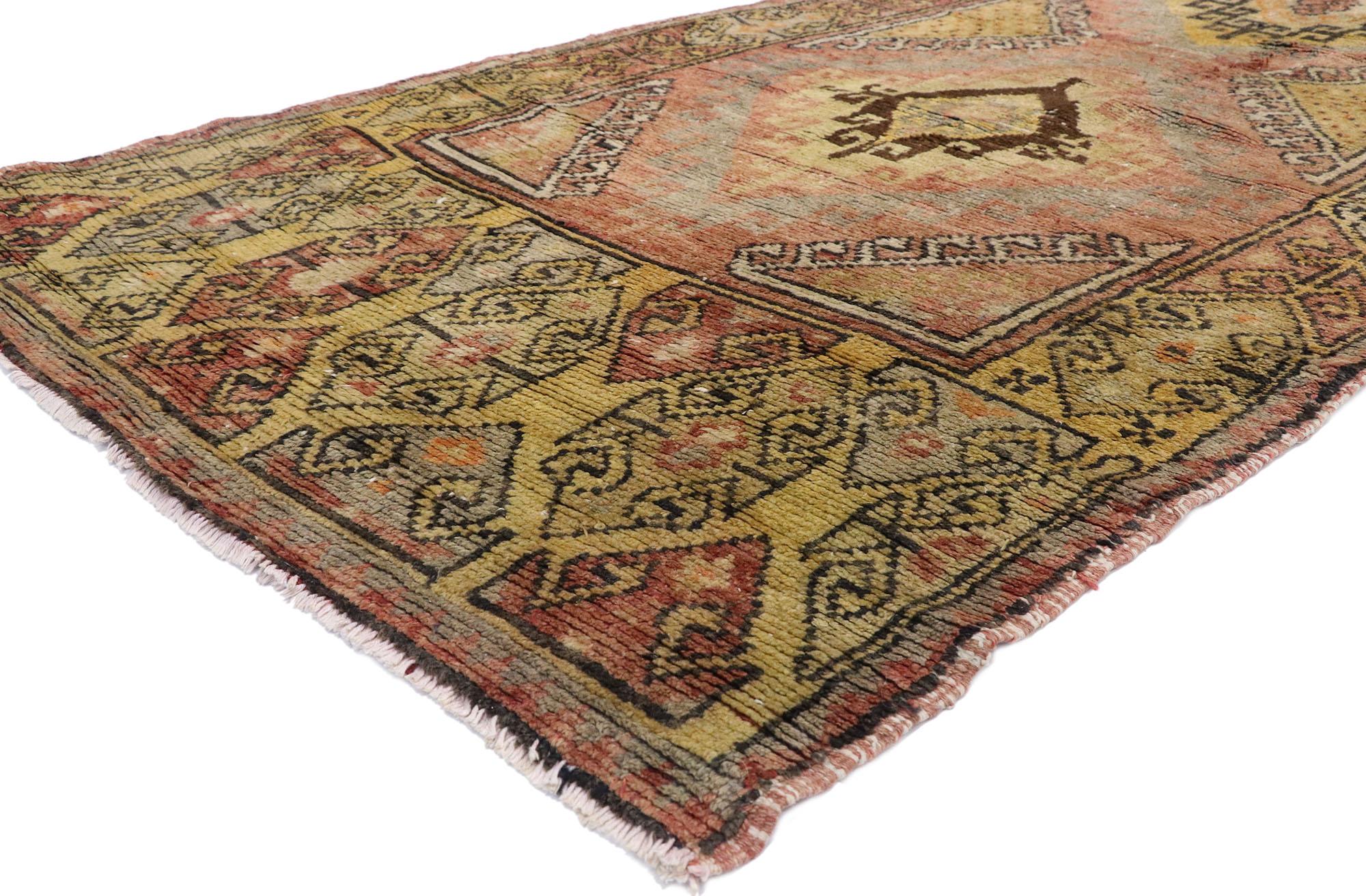 51659 Vintage Turkish Oushak Runner with Mid-Century Modern Style, Hallway Runner 03'10 x 11'07. This hand-knotted wool vintage Oushak runner features three diamond medallions bordered in 'tarantula' patterns; the amulet style medallions rest on a