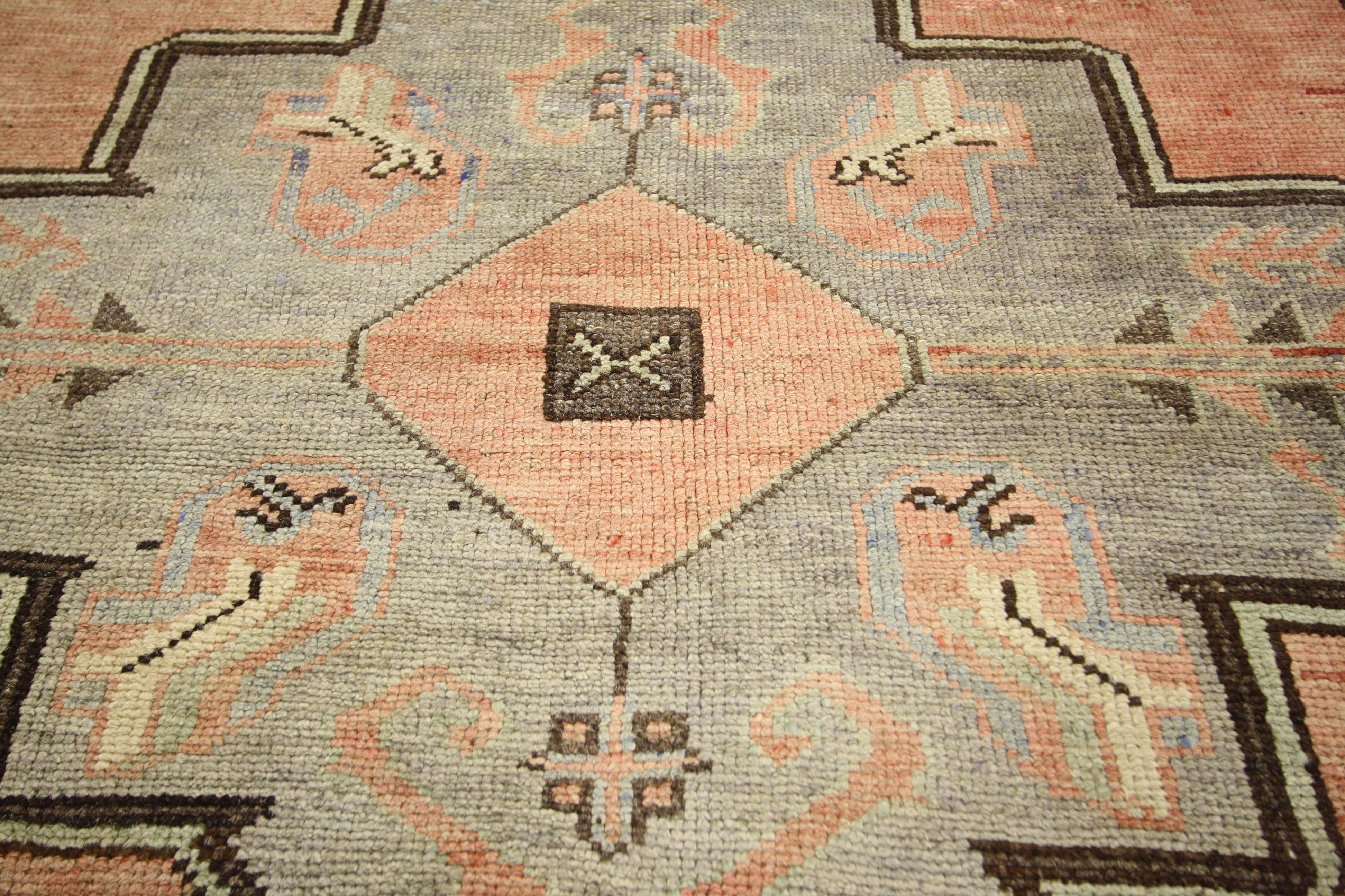 50088 Vintage Turkish Oushak Hallway Runner with Amulet Design 04'01 x 10'08. This hand-knotted wool vintage Turkish Oushak runner features three large-scale stepped geometric stylized gray amulets spread across an abrashed and muted rust colored