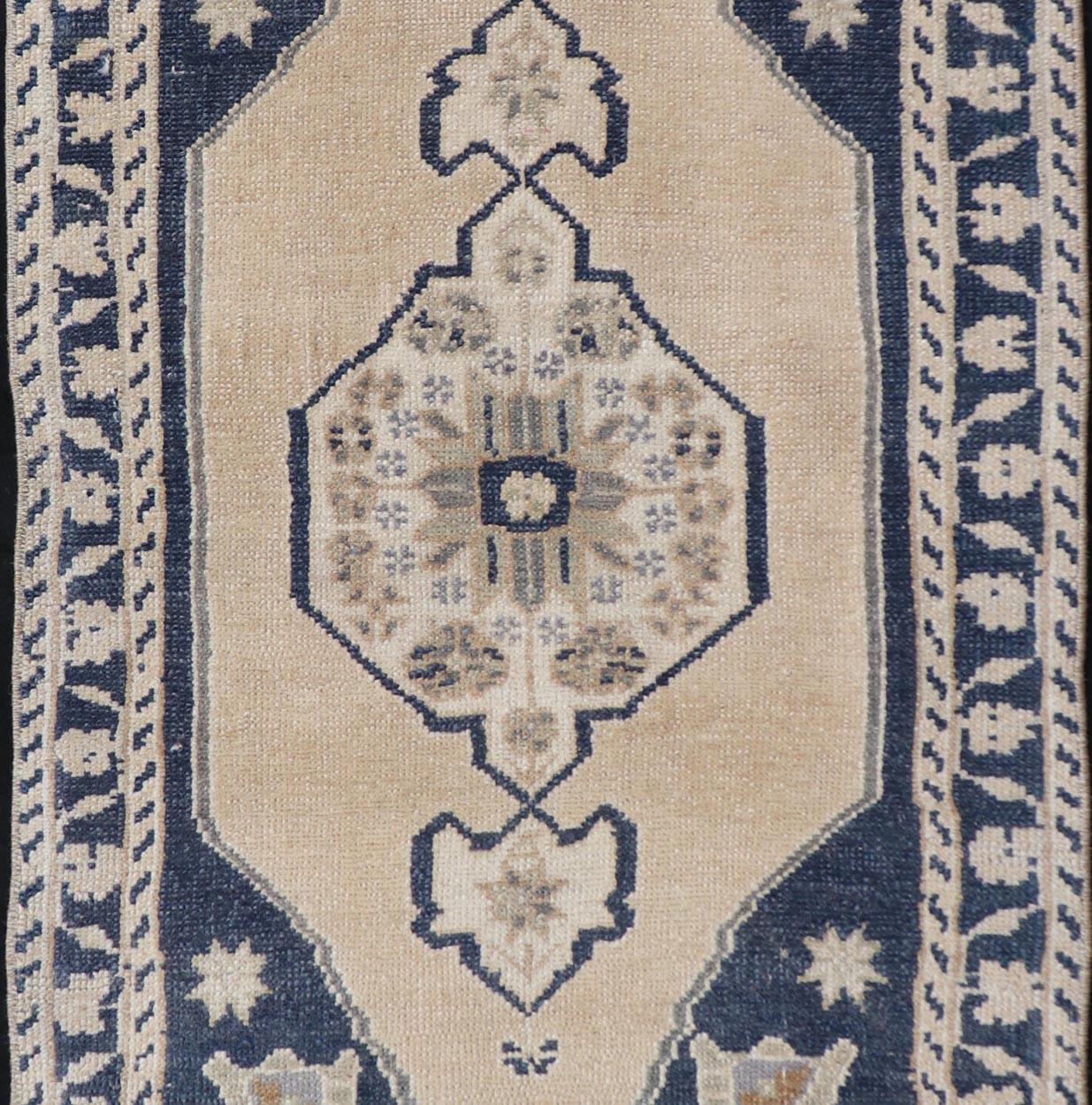 Hand-Knotted Vintage Turkish Oushak Rug with All-Over Sub-Geometric Medallion Design 