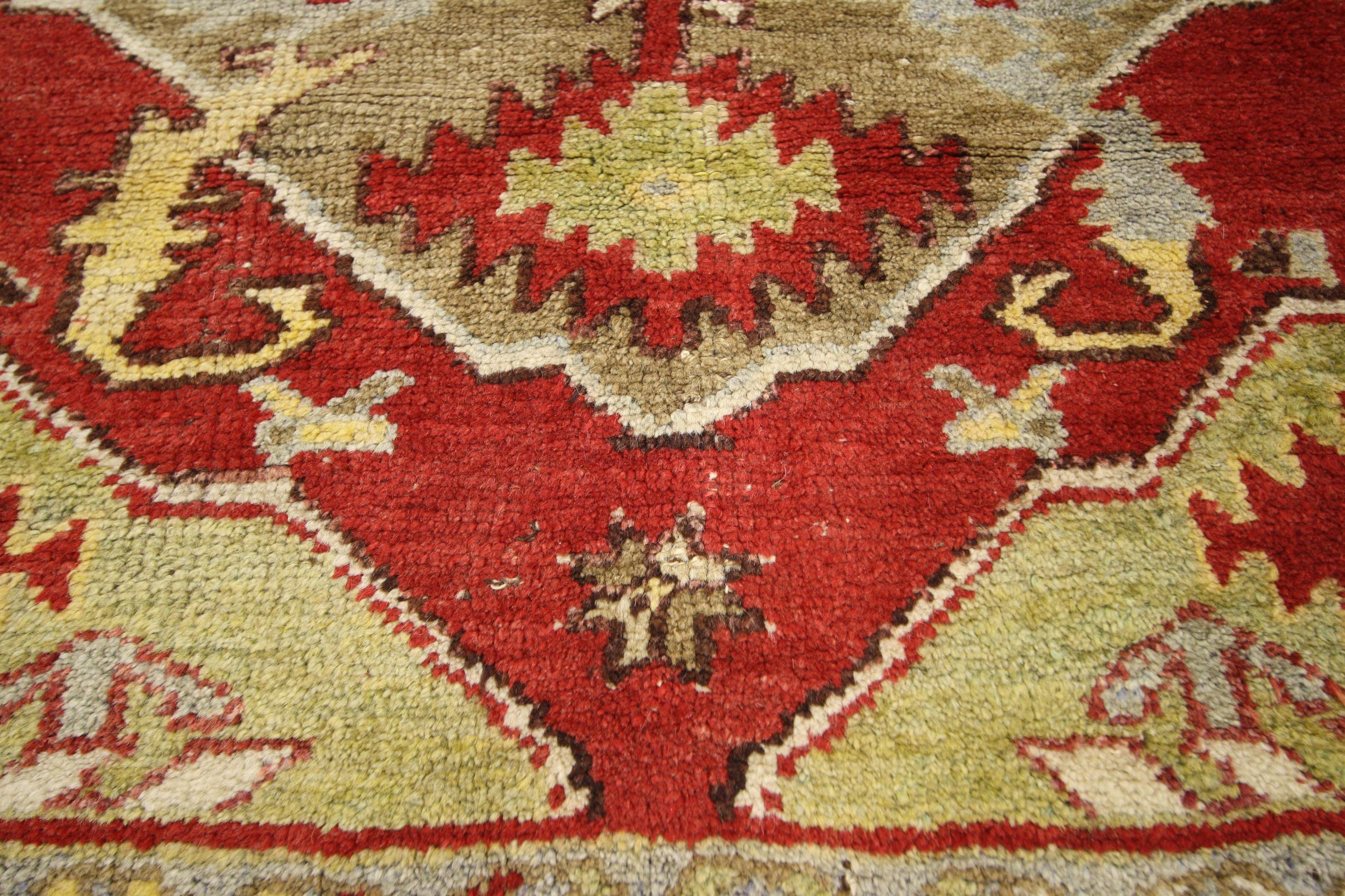 52323, vintage Turkish Oushak rug with Baroque style, small square accent rug. This small hand knotted wool vintage Turkish Oushak rug features an amulet medallion set with joined serrated edge pendants and four curling acanthus leaves that extend