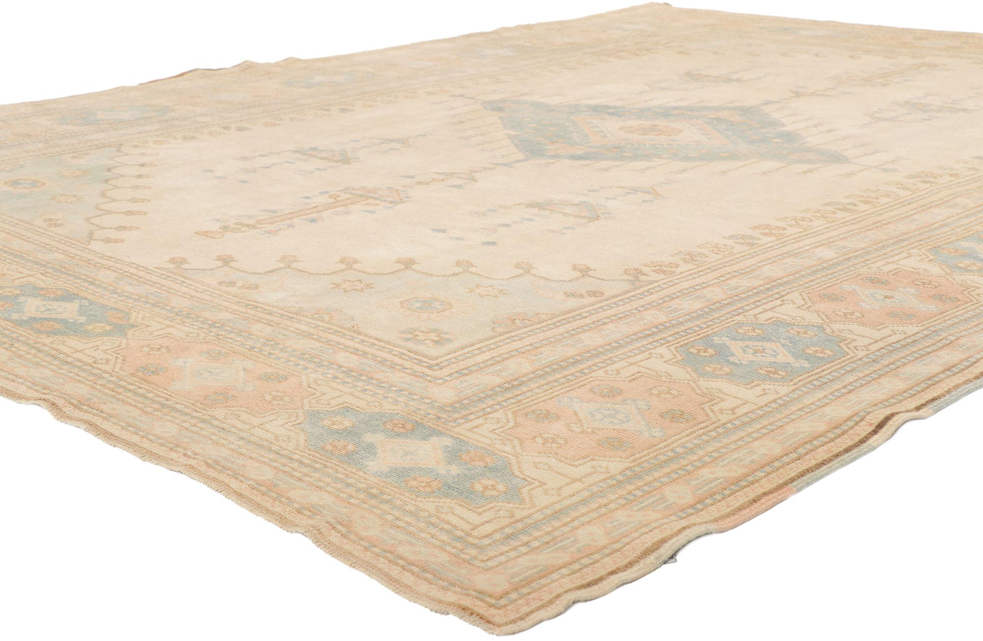 53728 vintage Turkish Oushak rug with Boho Tribal Style 7'00 x 9'04. Full of tiny details and an expressive tribal design combined with soft pastel colors, this hand-knotted wool vintage Turkish Oushak rug is a captivating vision of woven beauty.