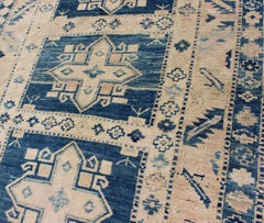 Vintage Turkish Oushak Rug with Bold Indigo Medallions and Cream Field 4'6 x 7'3
