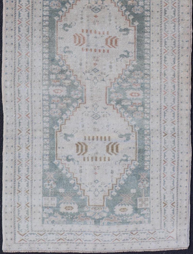 Wool Vintage Turkish Oushak Rug with Central Medallions in Cream and Light Green For Sale