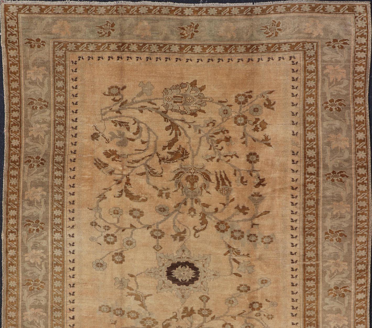 Hand-Knotted Vintage Turkish Oushak Rug with Detailed Vines and Flowers in Earthy Tones For Sale