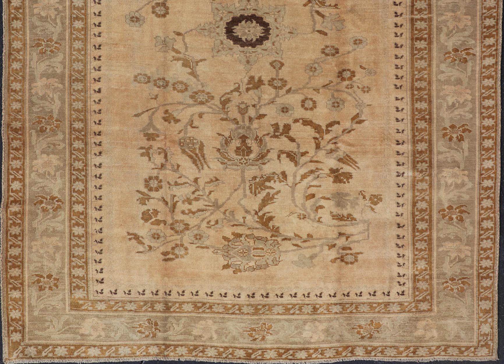 20th Century Vintage Turkish Oushak Rug with Detailed Vines and Flowers in Earthy Tones For Sale