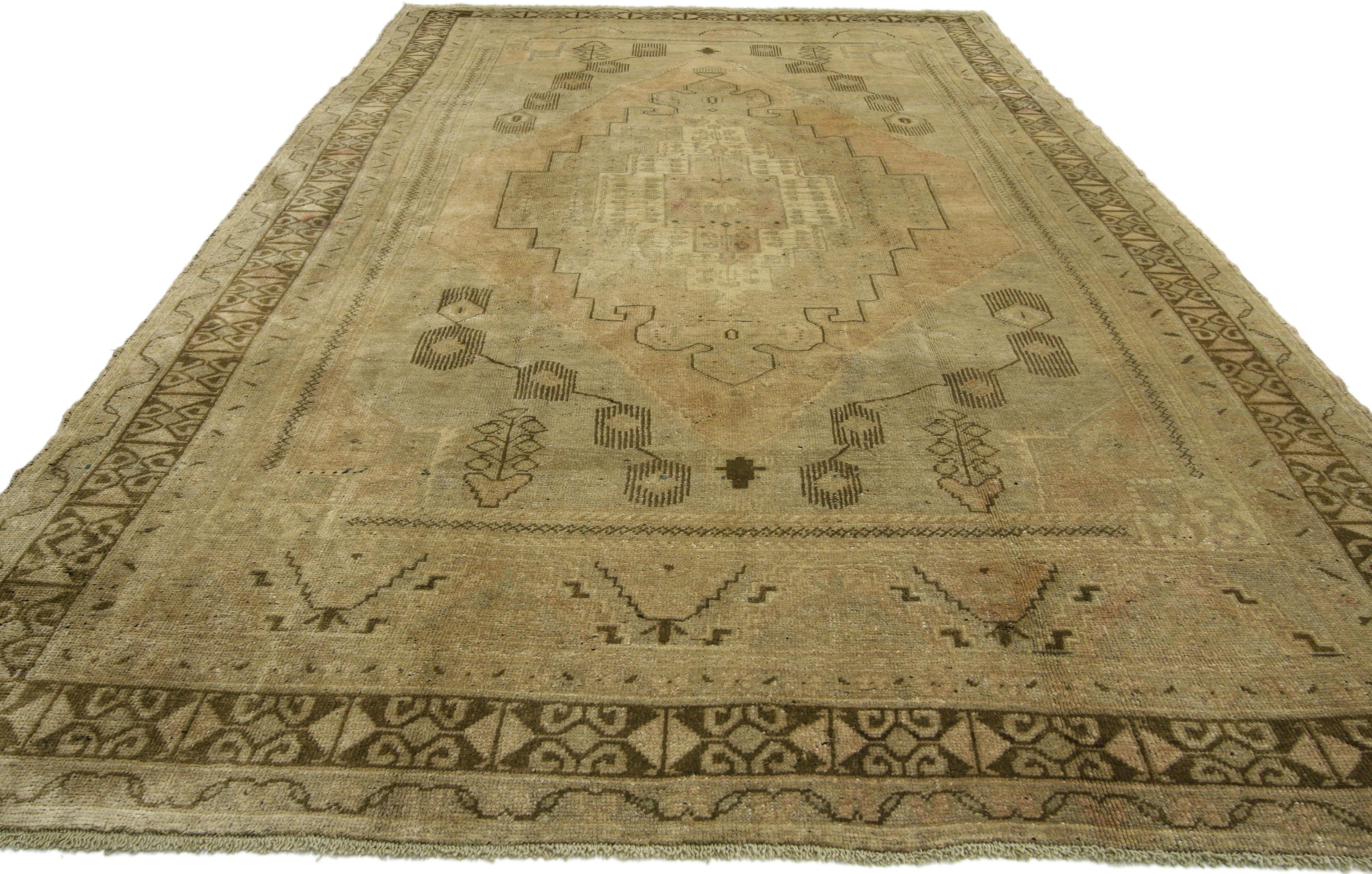 50518, vintage Turkish Oushak rug with earthy rustic style, hallway runner 06'00 x 10'06. Earthy rustic style meets refined elegance. This hand knotted wool vintage Turkish Oushak rug features a large-scale stepped medallion with trefoil tips on