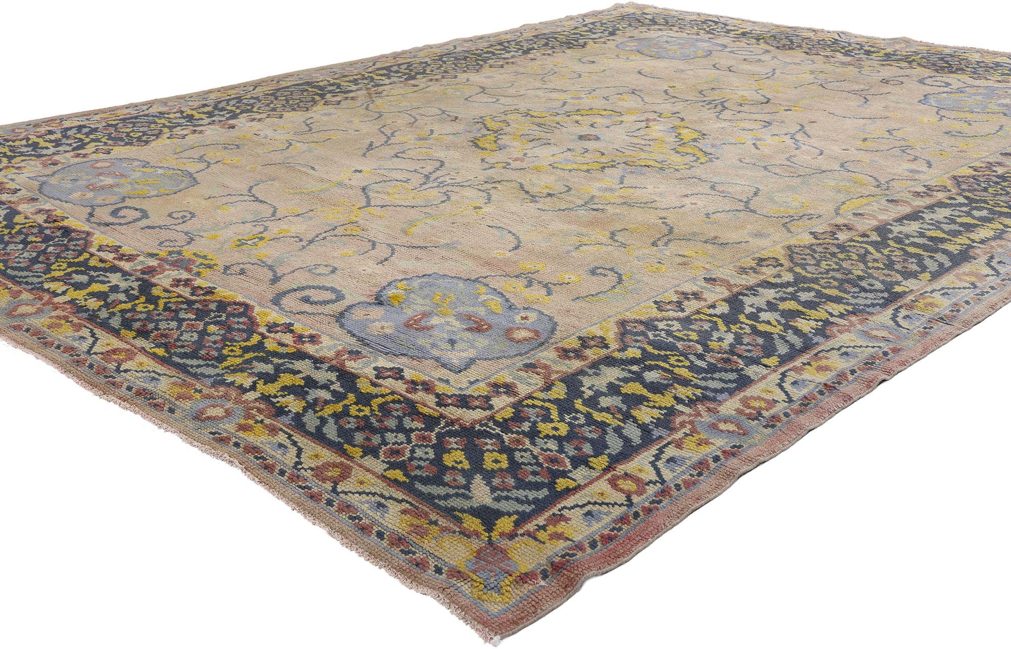 72323 Vintage Turkish Oushak Rug, 07'06 x 09'06. In the heart of Anatolia, where the whispers of the past dance with the winds, this hand-knotted wool vintage Turkish Oushak rug unfurls like a page from a forgotten tale. Its delicate palette, softly