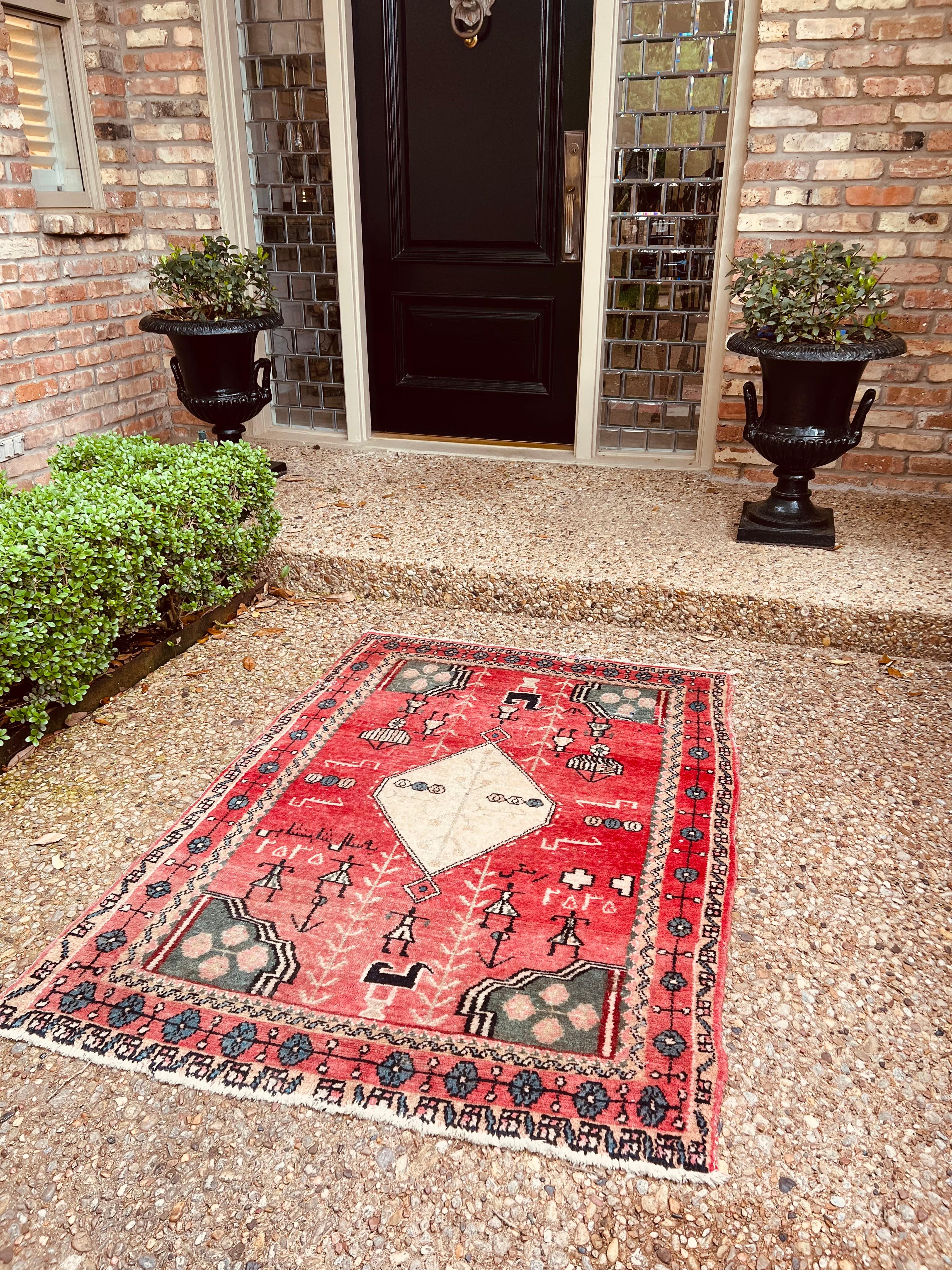The beauty of this rug is in its imperfections.  Time has softened its color palette, yet it's soul remains vibrant with quiet nobility.  With hues of hot pink, red, sage and soft pink, this rug will make a lovely statement in your room.  As found