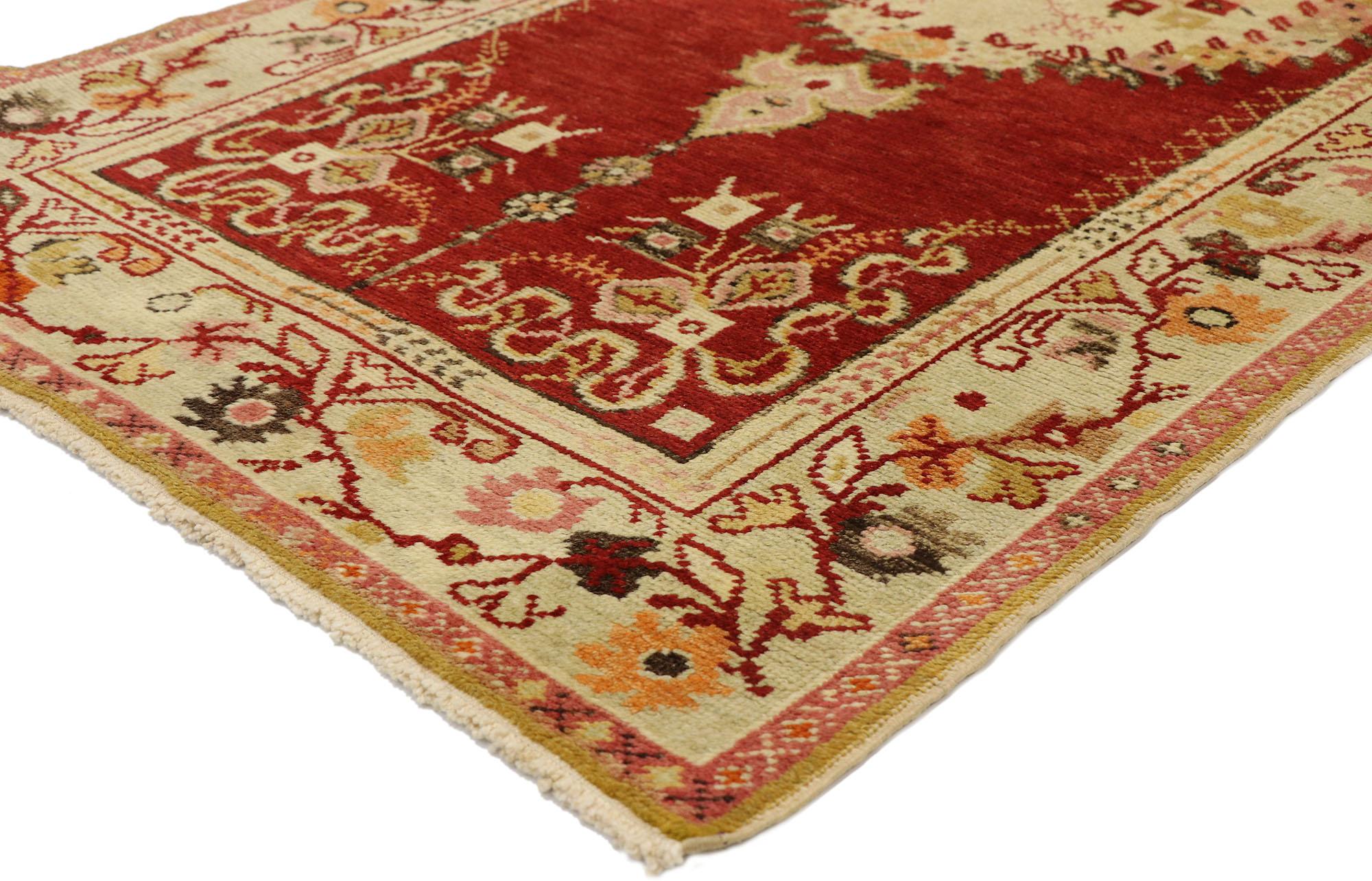50104, vintage Turkish Oushak rug with French Rococo style, Entry or Foyer rug. This traditional style Oushak rug features a central geometric beige medallion surrounded by a medallion border of cubes in pastel hues, a bouquet of flowers in the