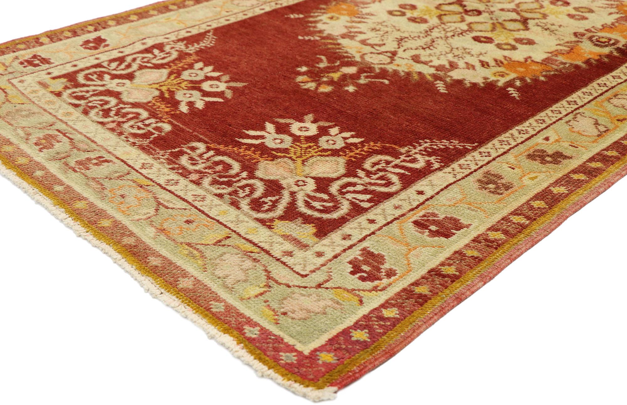 50996, vintage Turkish Oushak rug with French Rococo style, kitchen, foyer or entry rug. French Rococo Romanticism meets timeless Anatolian tradition in this Classic style vintage Turkish Oushak rug. Set with an elaborate round-oval medallion