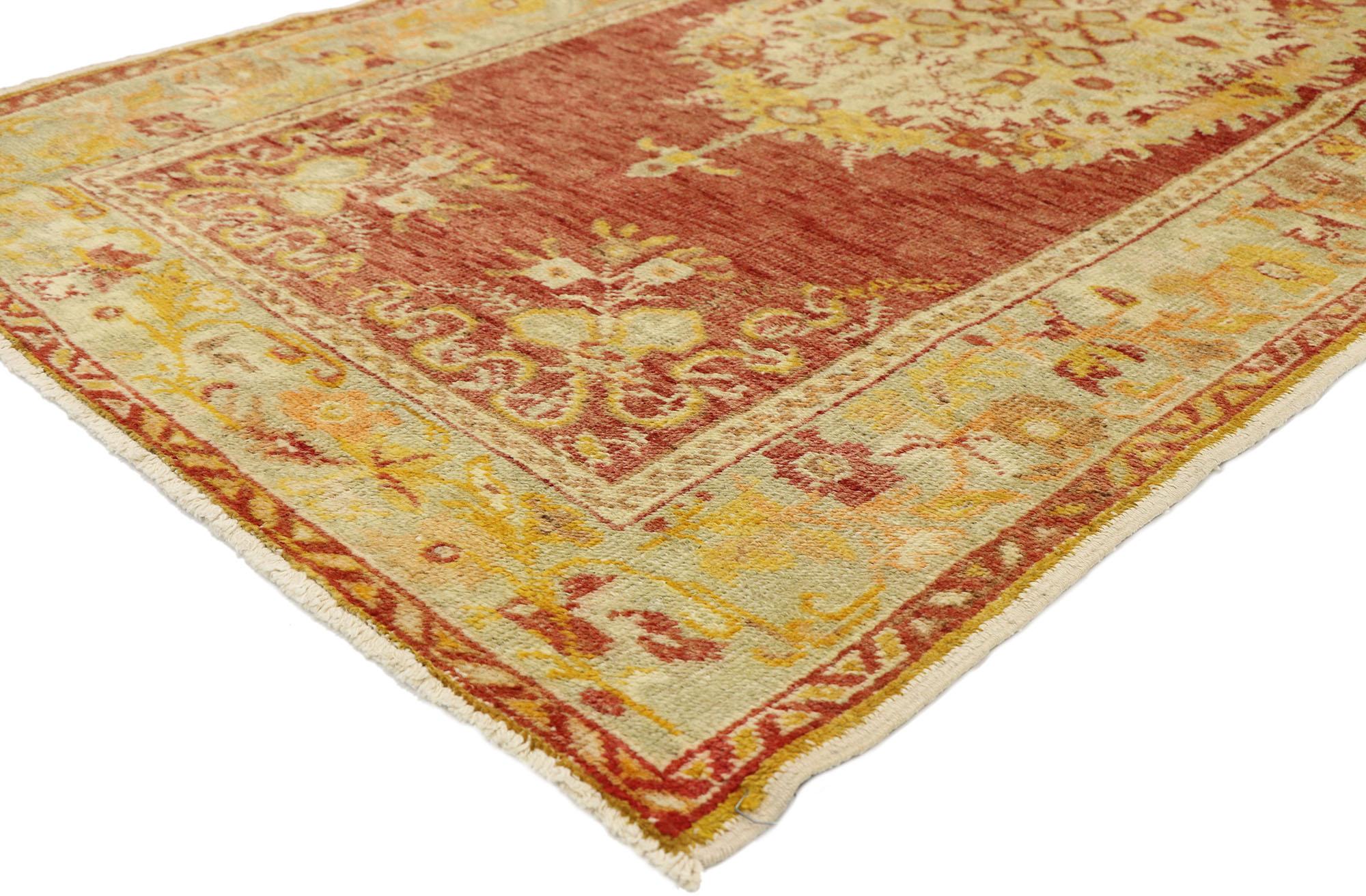 50998 Vintage Turkish Oushak rug with French Rococo style, Kitchen, Foyer or Entry Rug. French Rococo Romanticism meets timeless Anatolian tradition in this Classic style vintage Turkish Oushak rug. Set with an elaborate round-oval medallion against