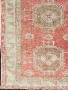 Vintage Turkish Oushak Rug with Soft Coral, Pale Mint, and Warm Beige Tones
