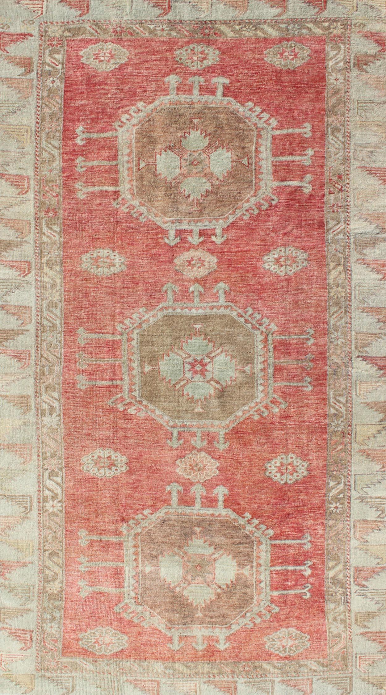 Hand-Knotted Vintage Turkish Oushak Rug with Geometric Medallions For Sale