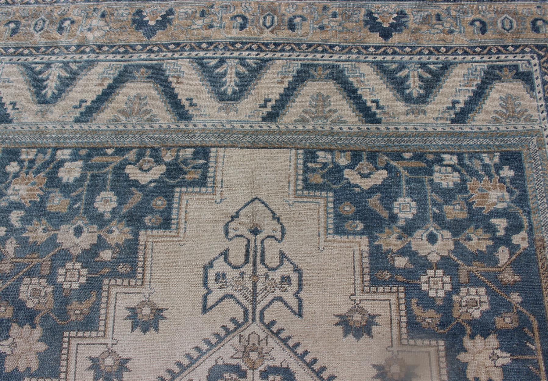 Wool Vintage Turkish Oushak Rug with Geometric Design in Blue, Taupe and Sand For Sale
